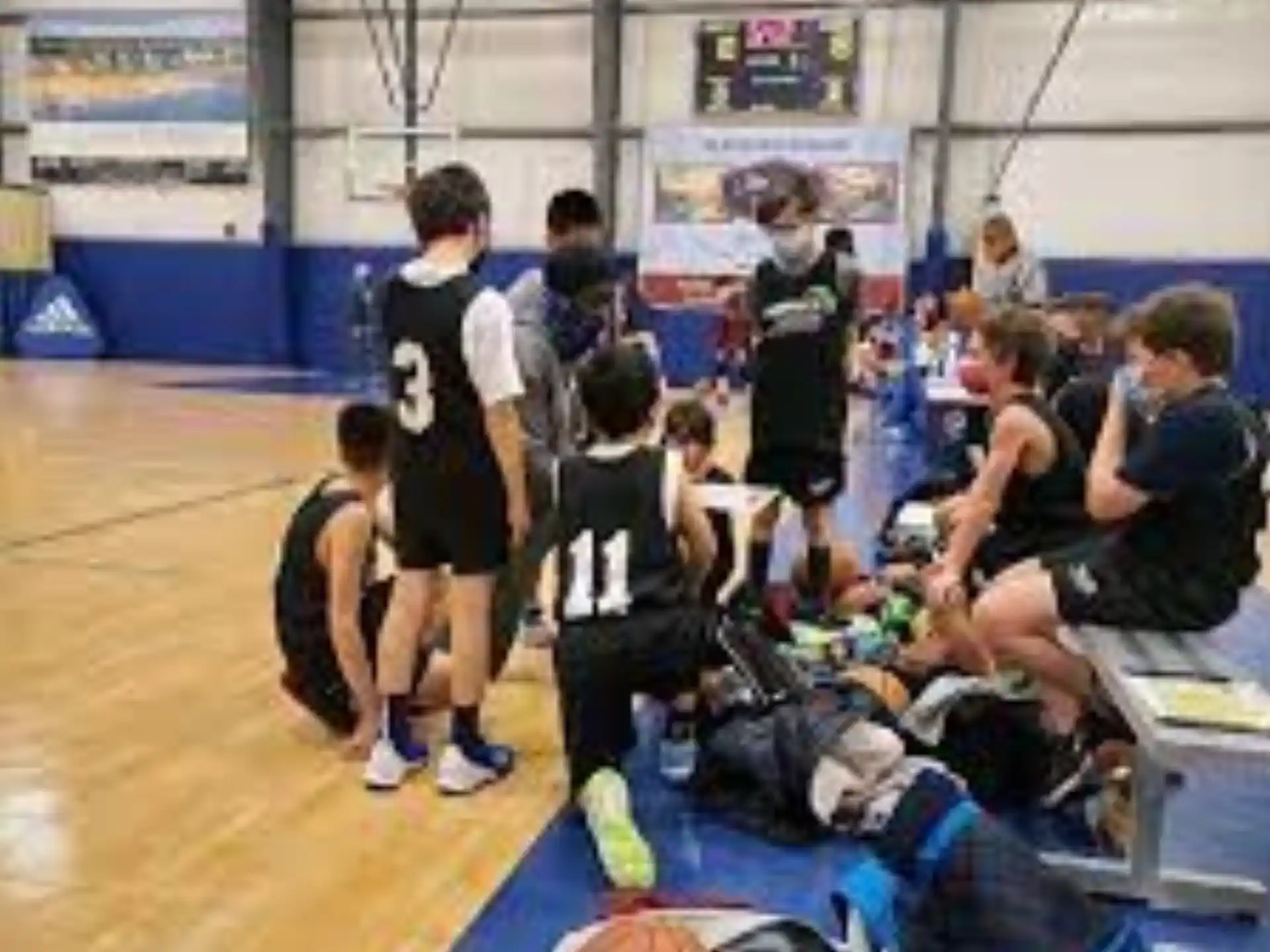 a group of people in a gym