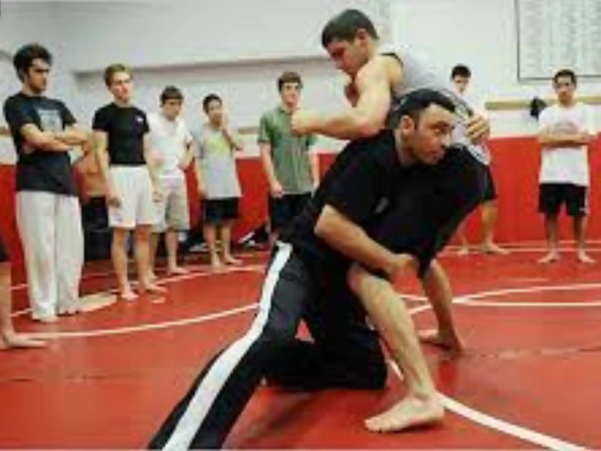 a group of people in a gym