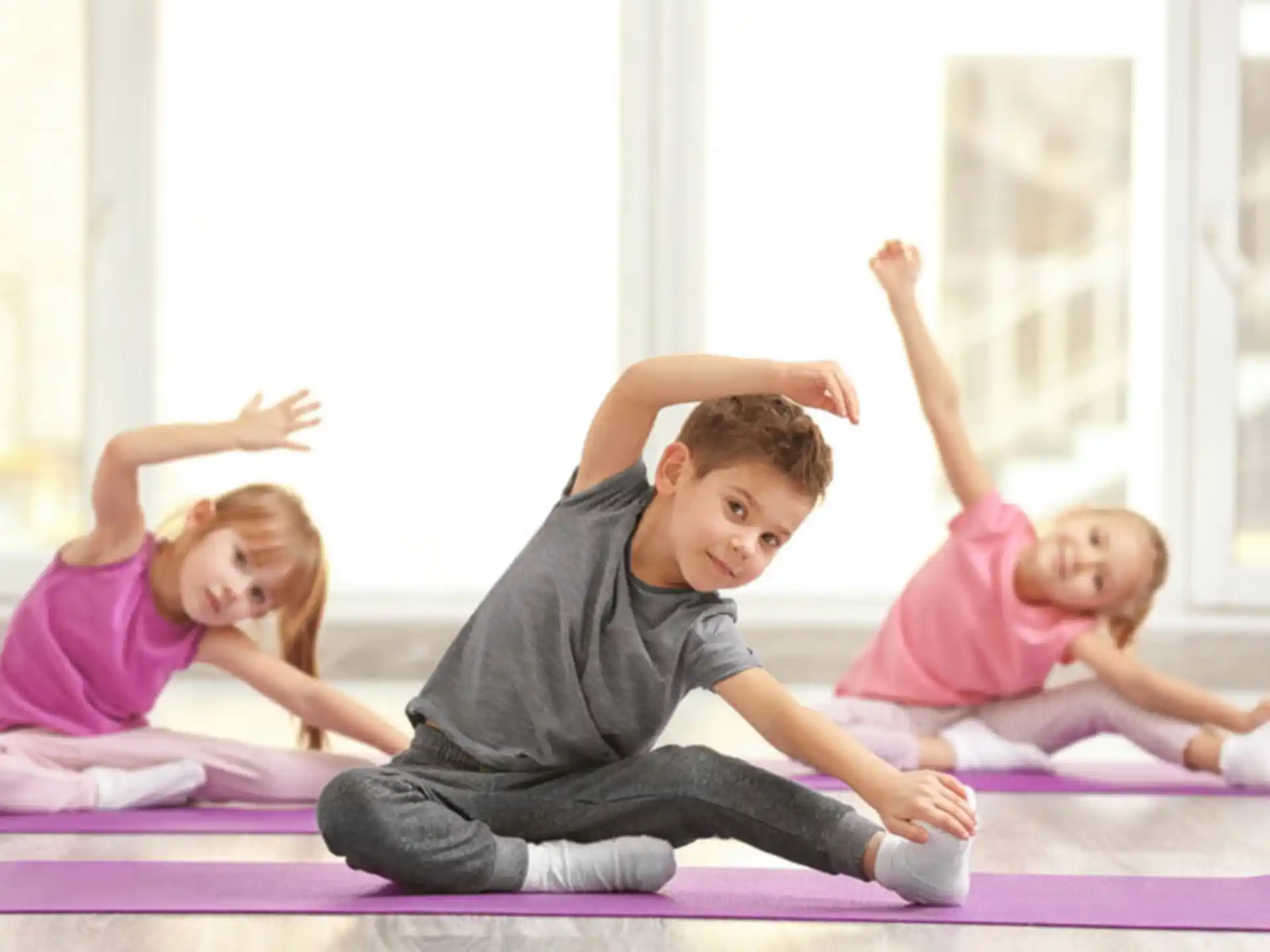 a group of children exercising