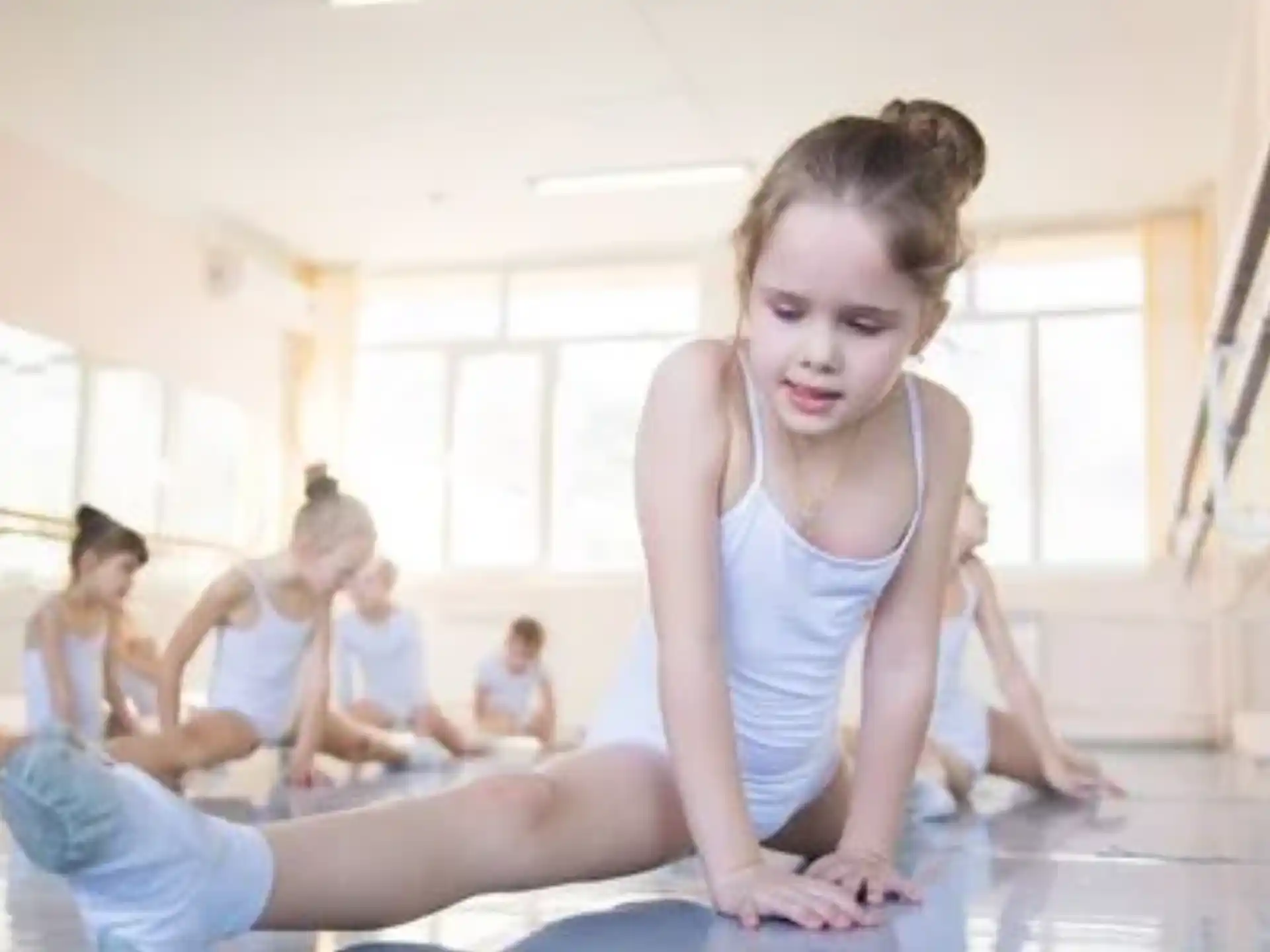 a woman doing yoga in a room