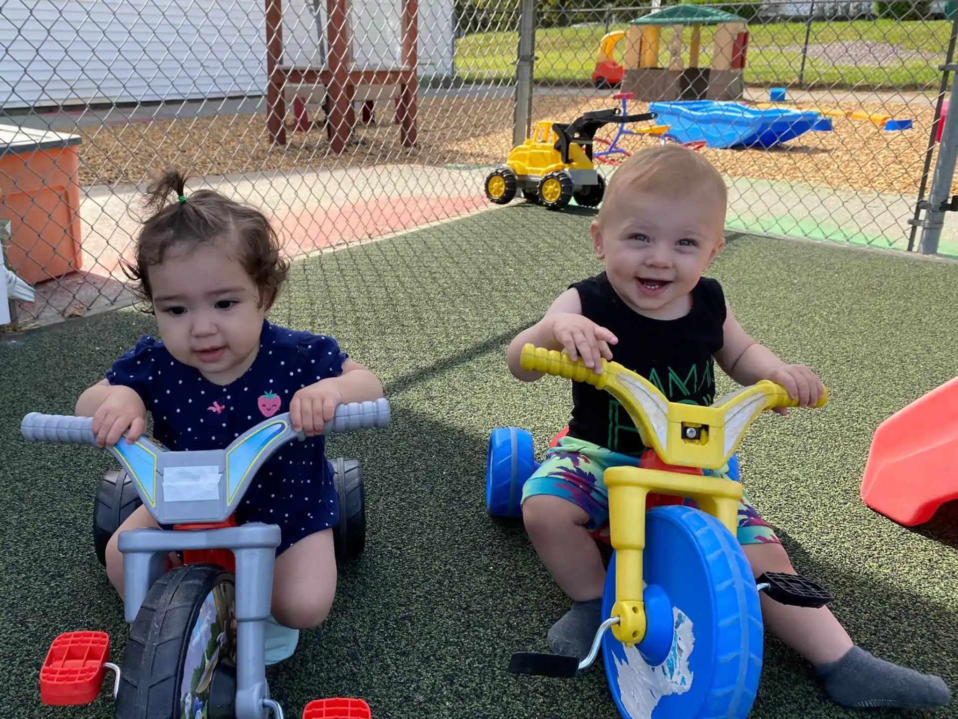 two children sitting in chairs