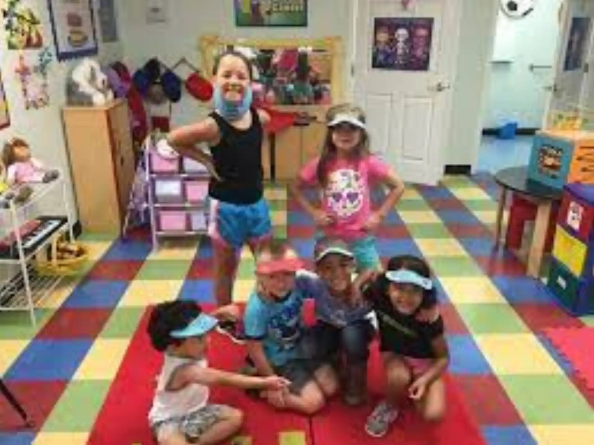 a group of children posing for a photo
