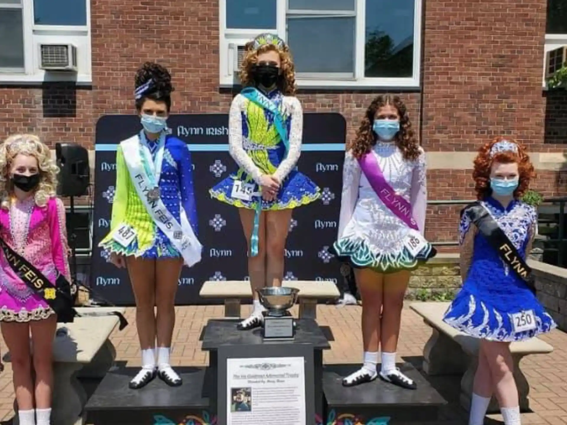 a group of girls wearing clothing