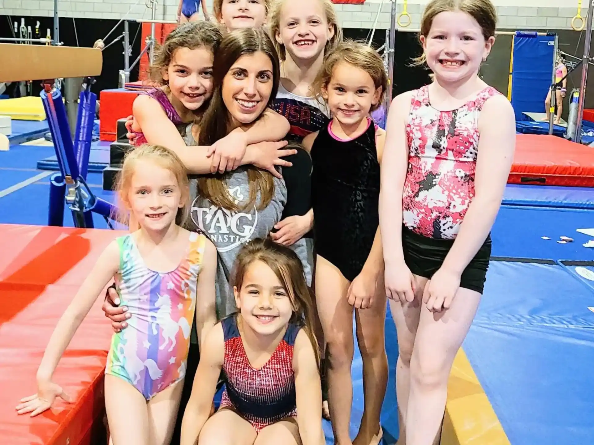 a group of girls posing for a photo