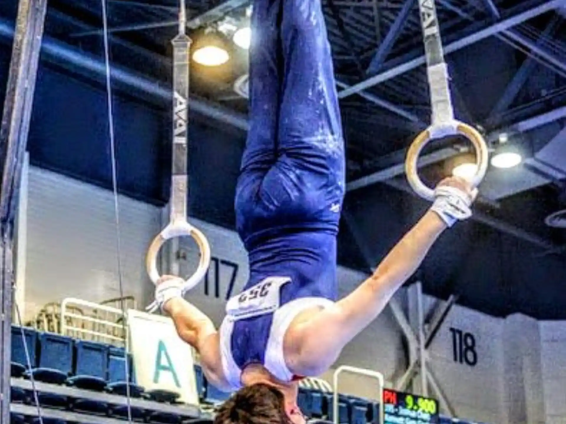 a person doing a back flip with a tennis racket