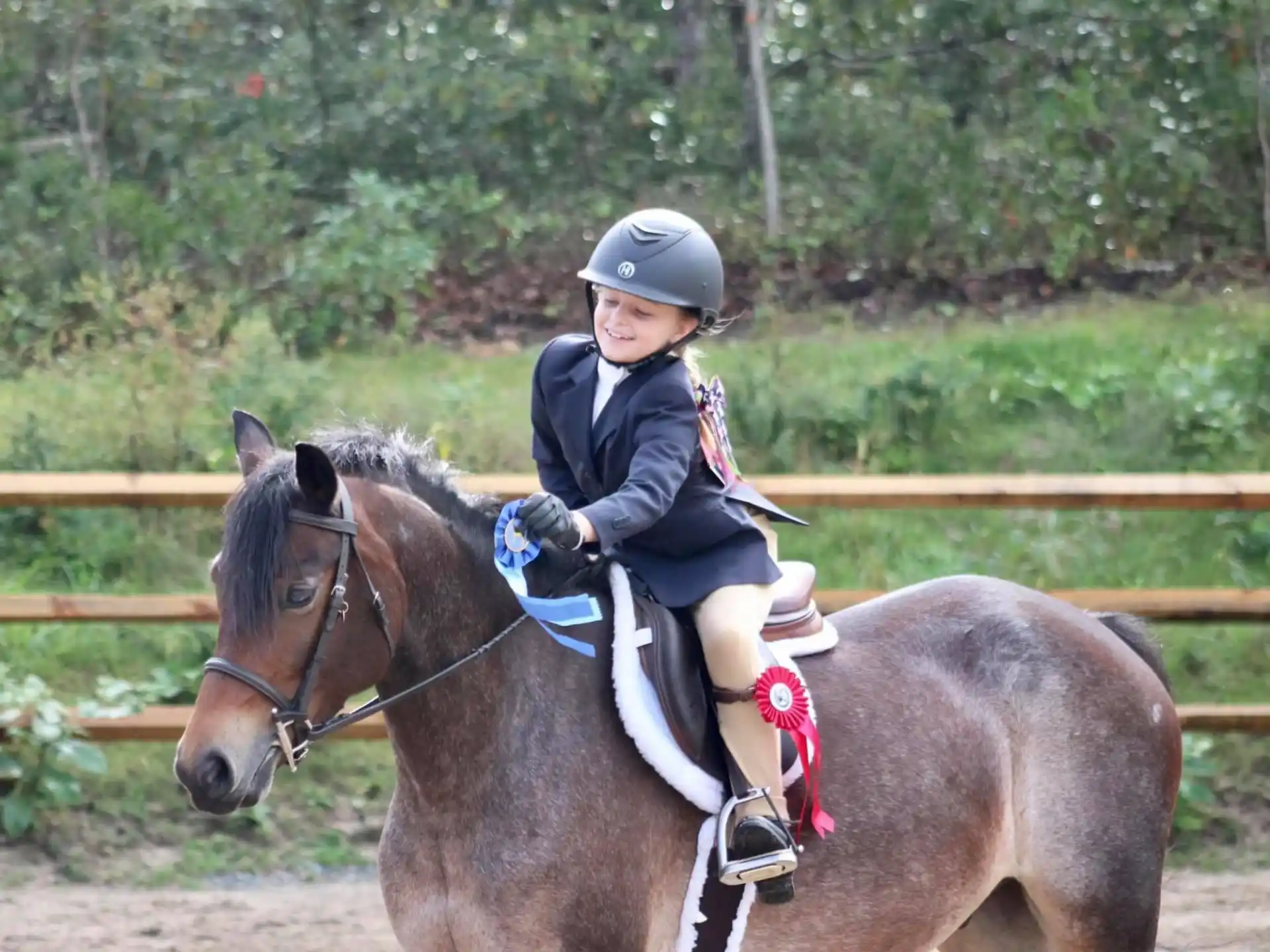 a girl riding a horse