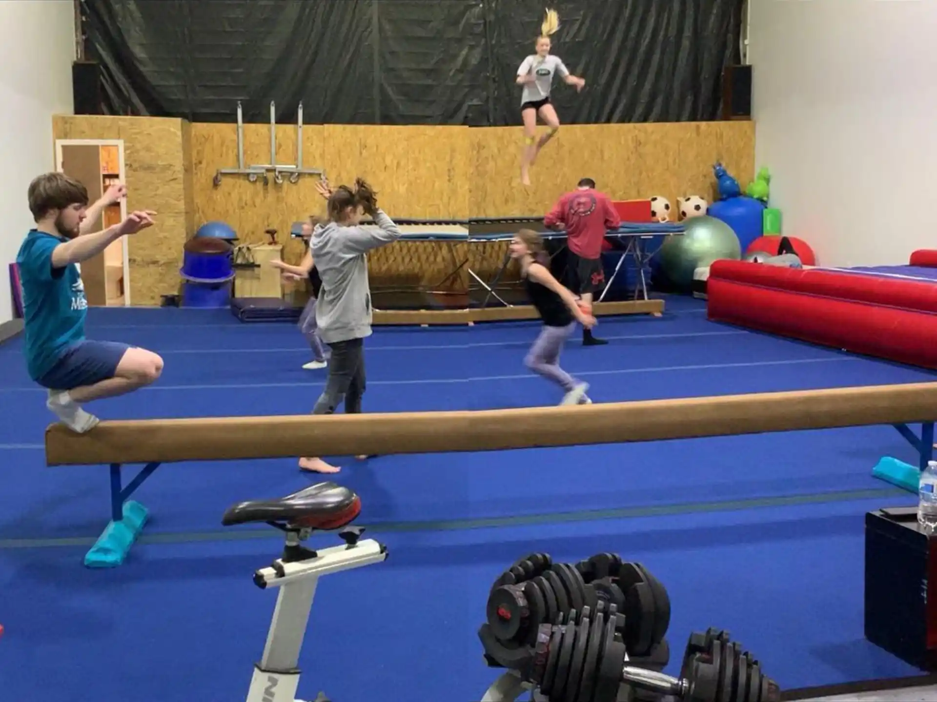 a group of people in a gym