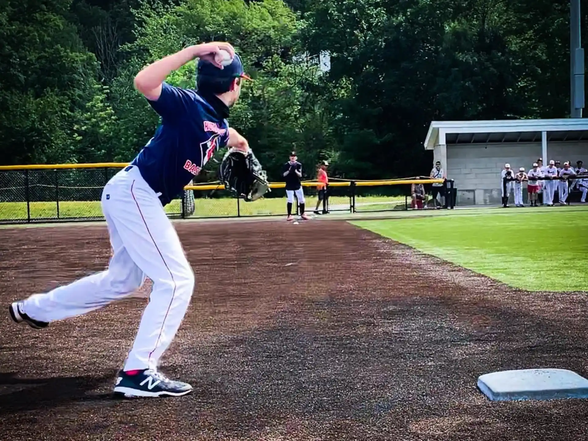a baseball player throwing a ball