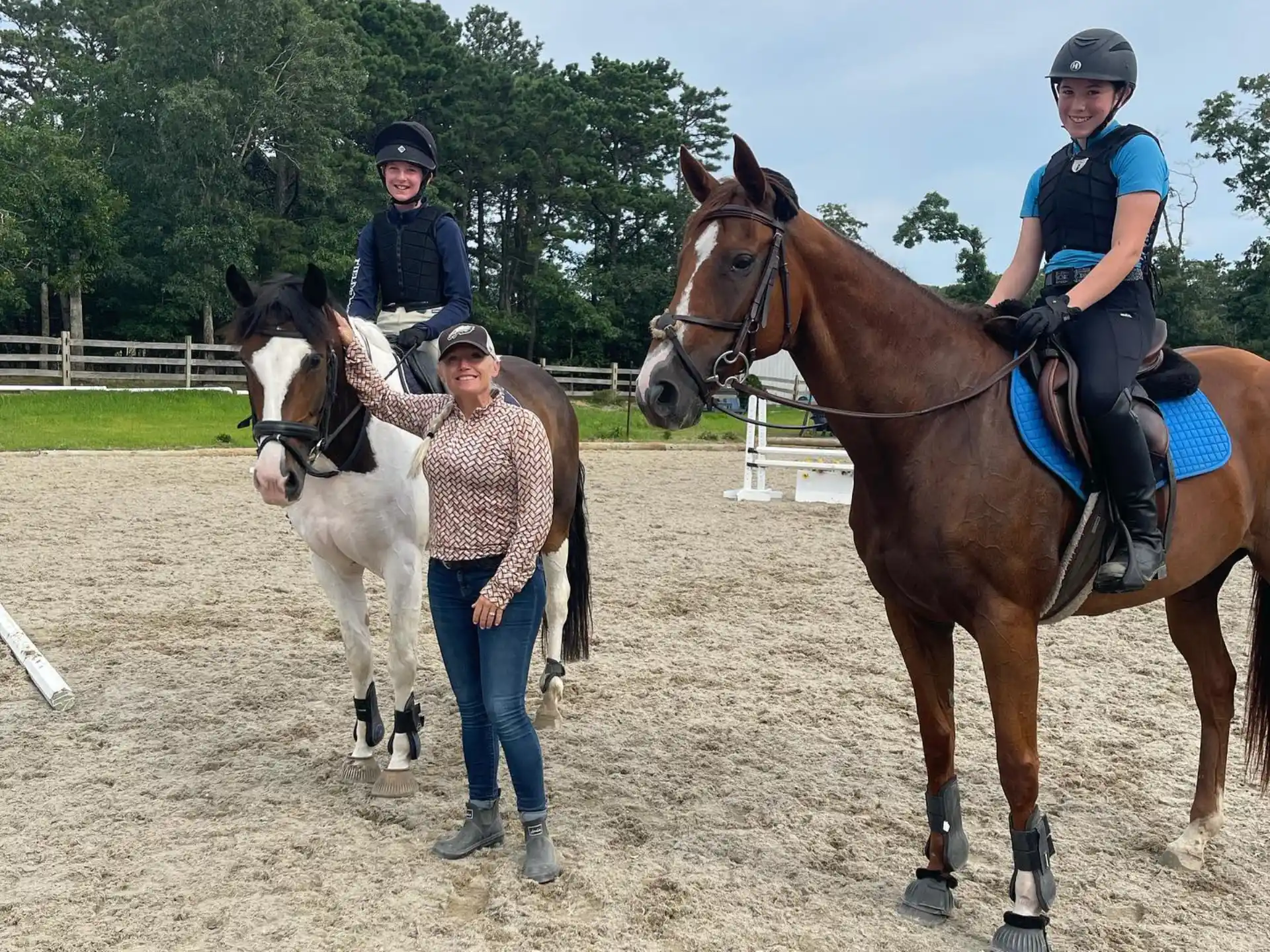 a group of people on horses
