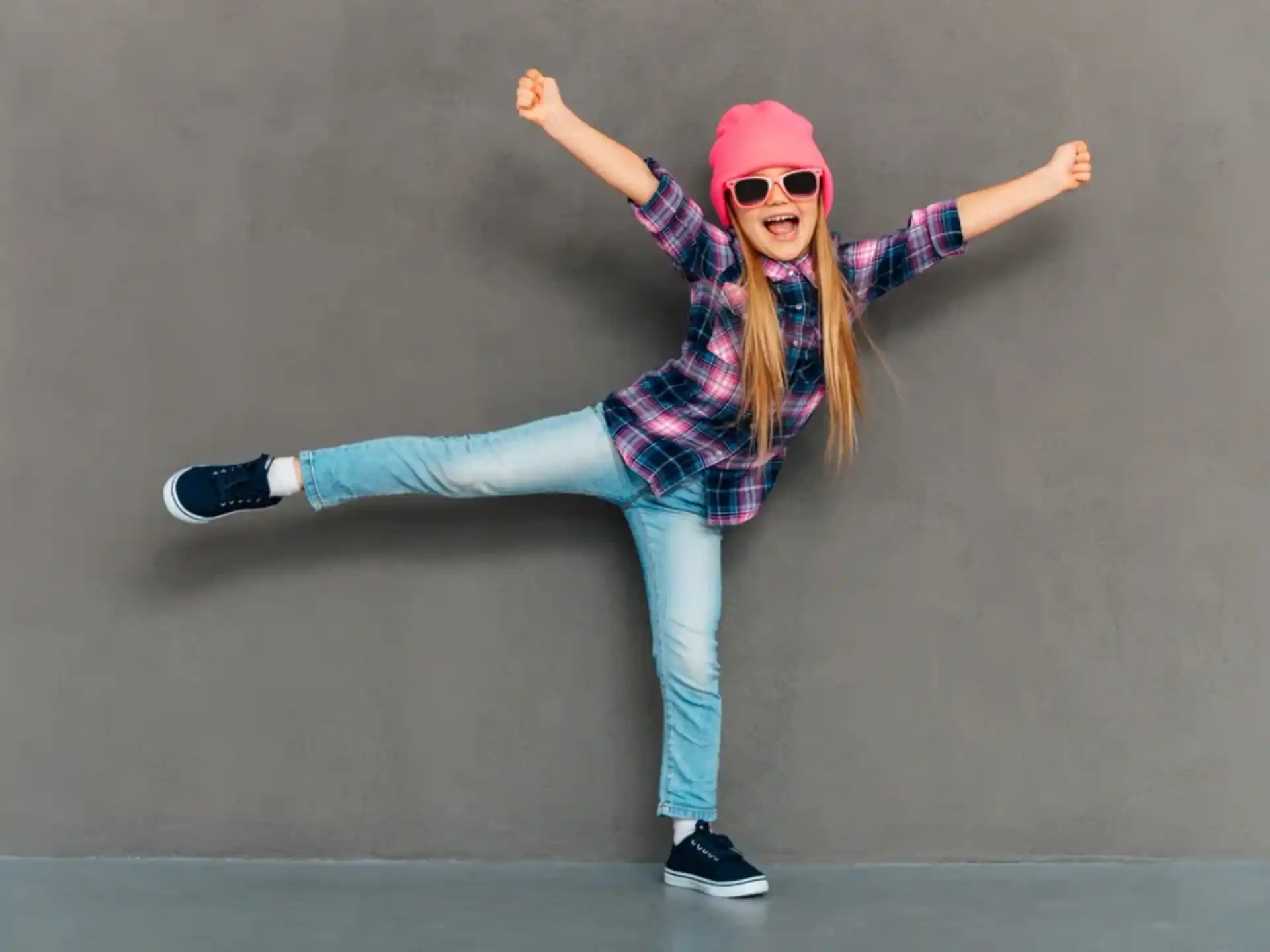 a person wearing a hat and sunglasses
