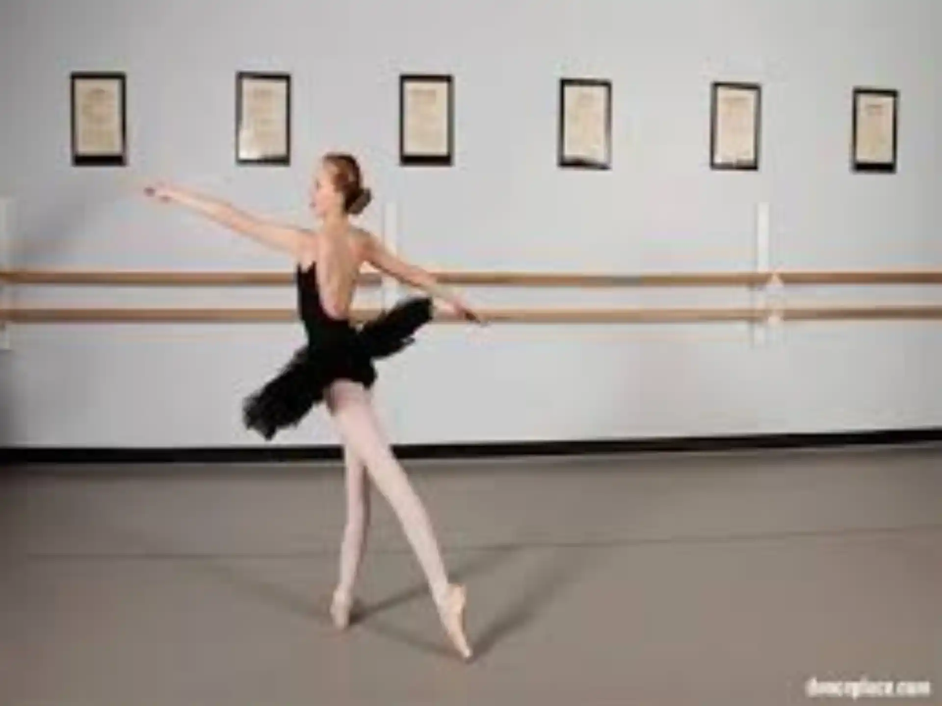 a woman dancing in a room