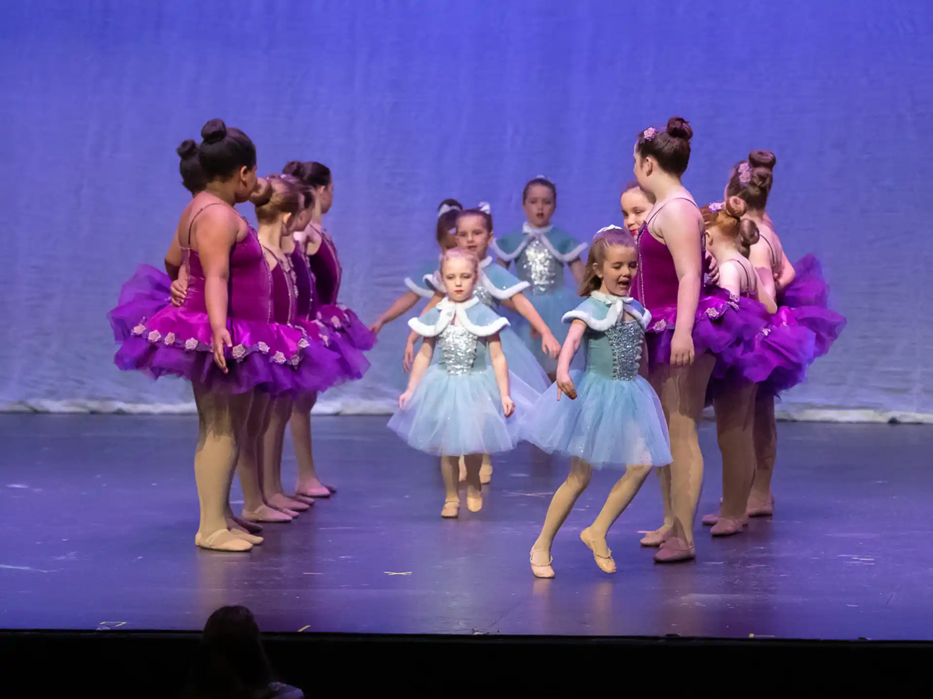 a group of people on a stage