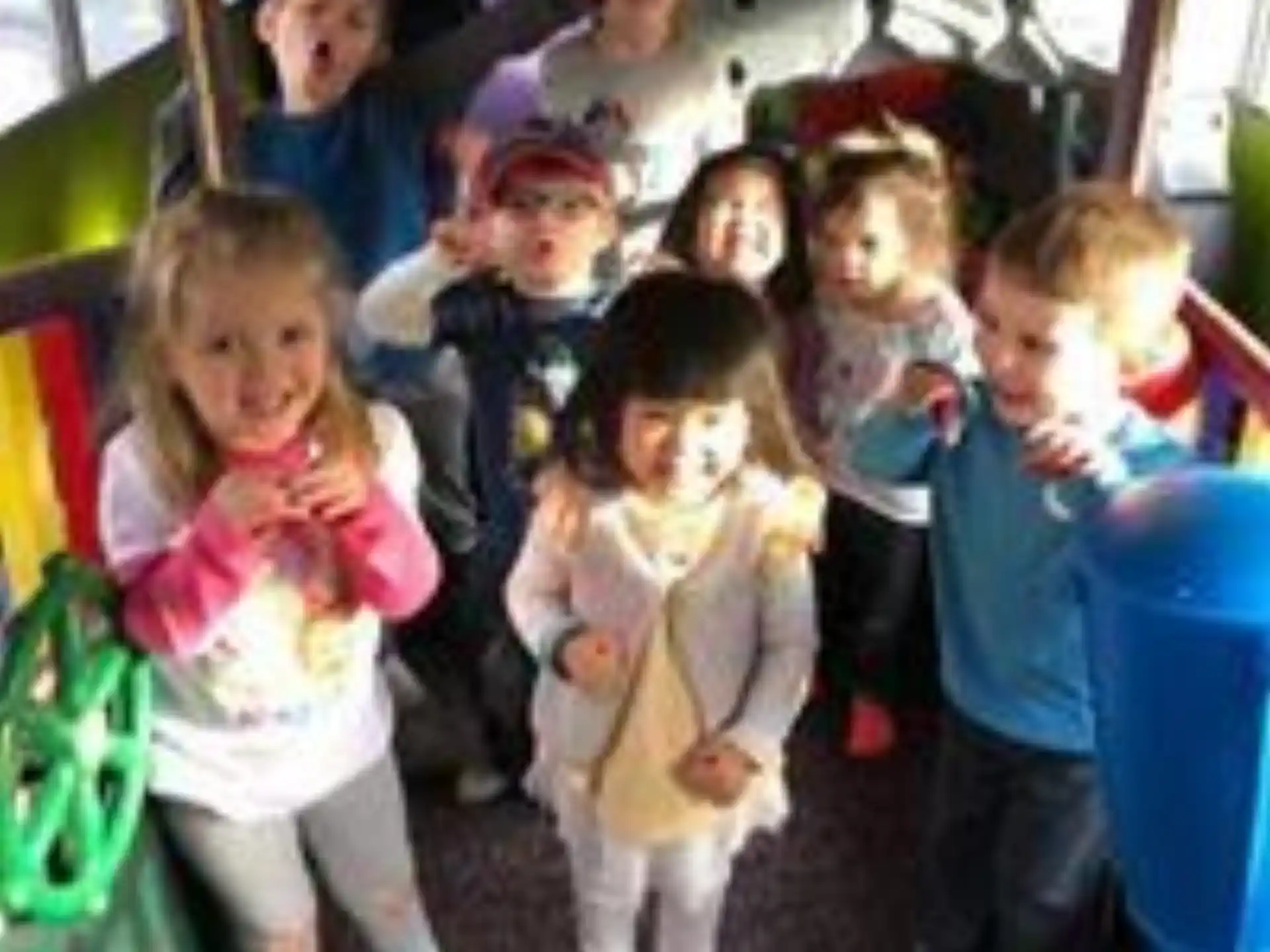 a group of children posing for a photo