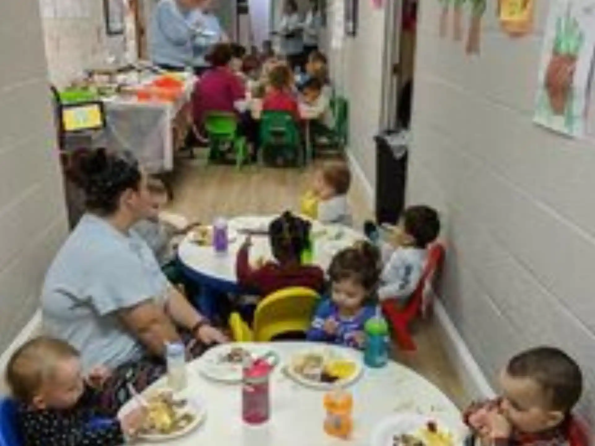 a group of people eating at a table