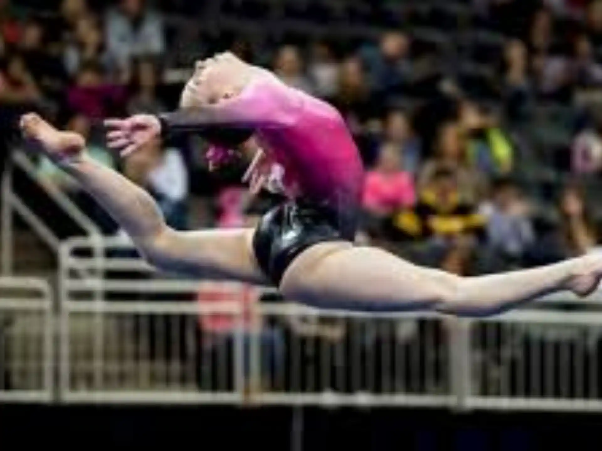 a person jumping over a railing
