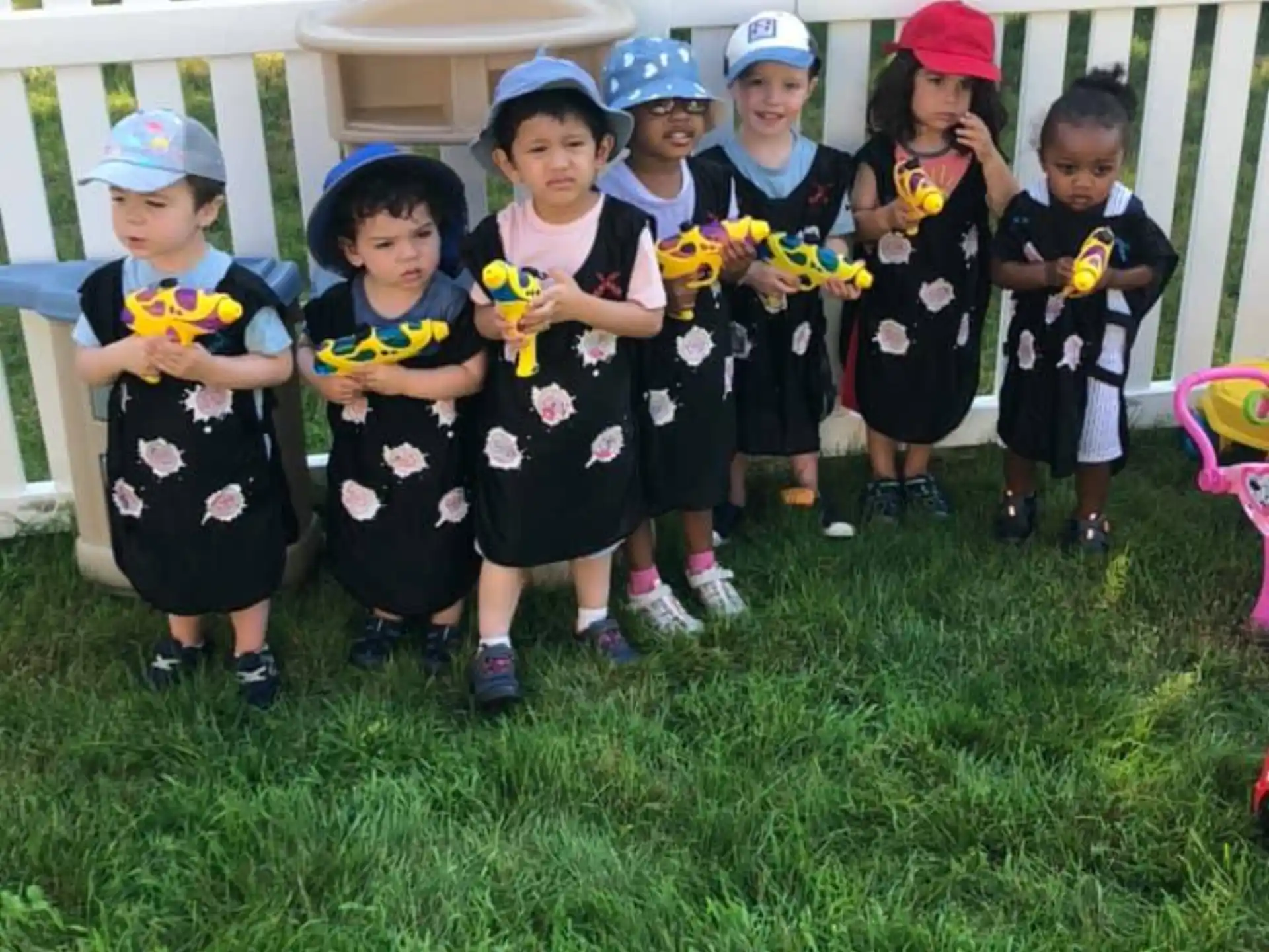 a group of children posing for a photo