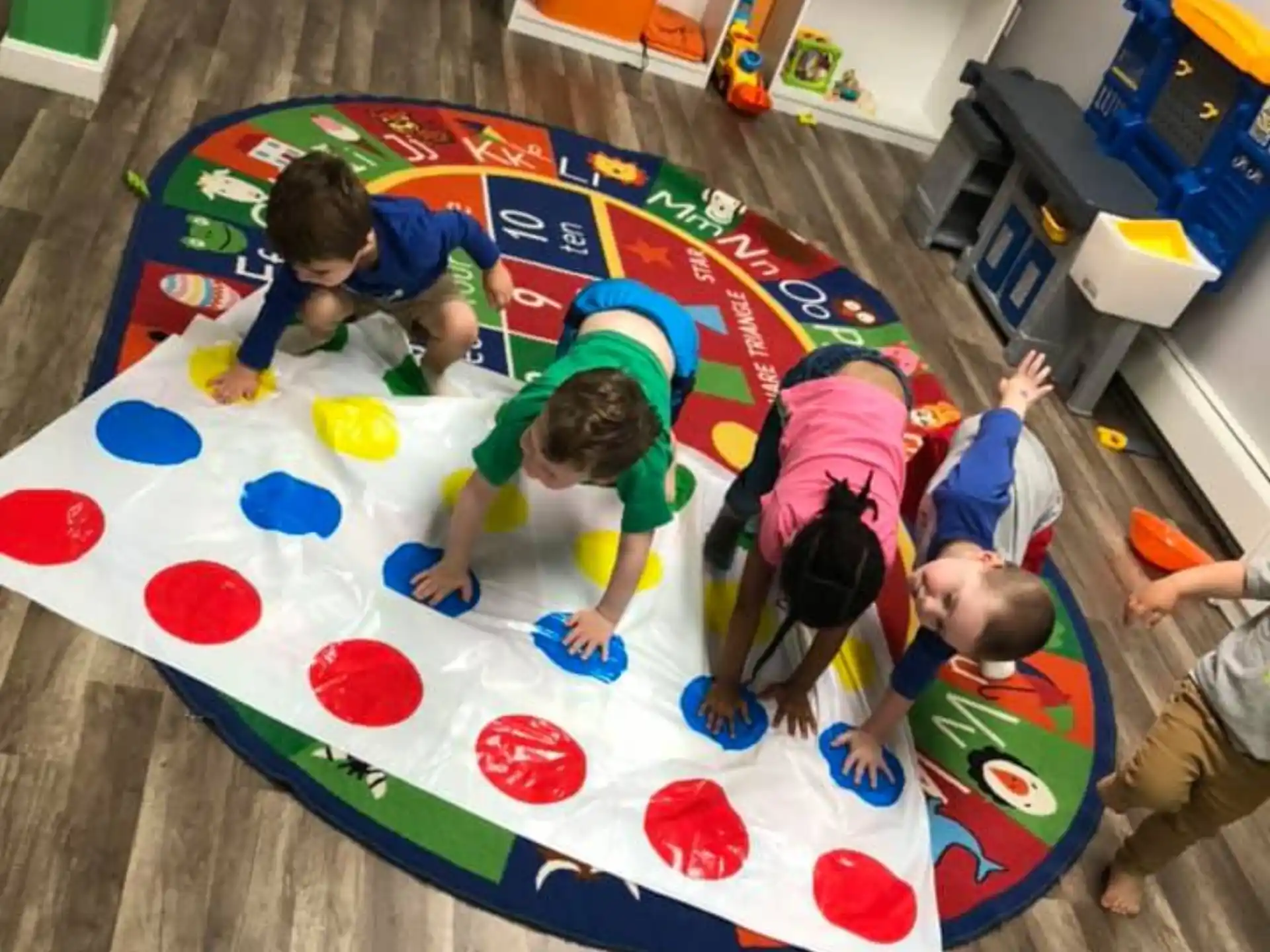 children playing on a mat