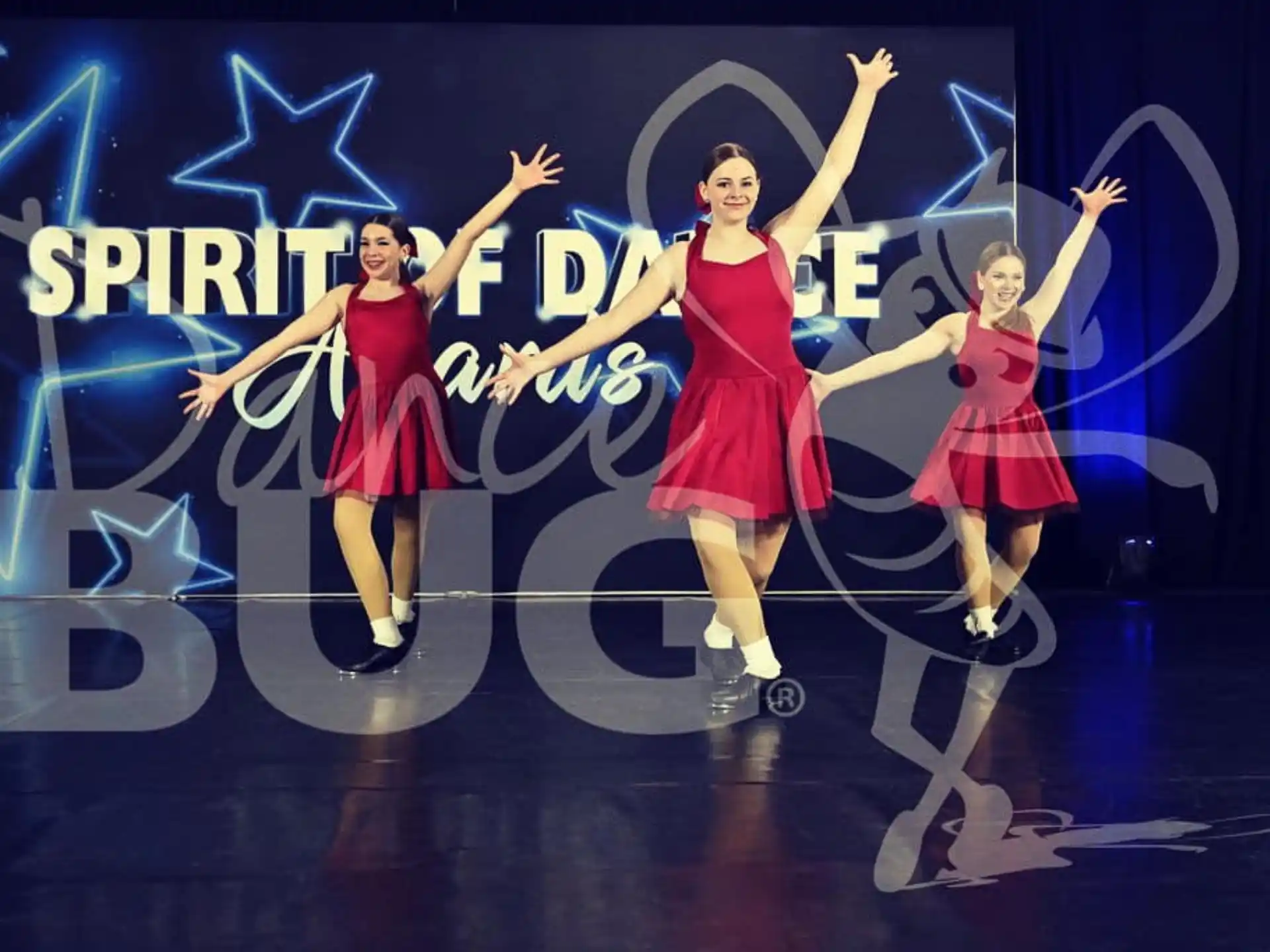a group of women dancing on a stage