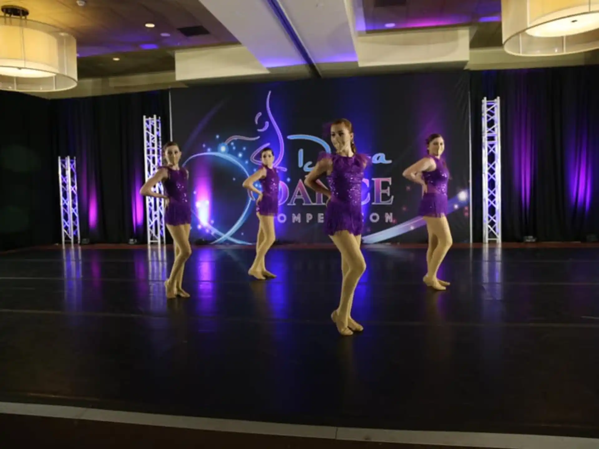 a group of women dancing on a stage