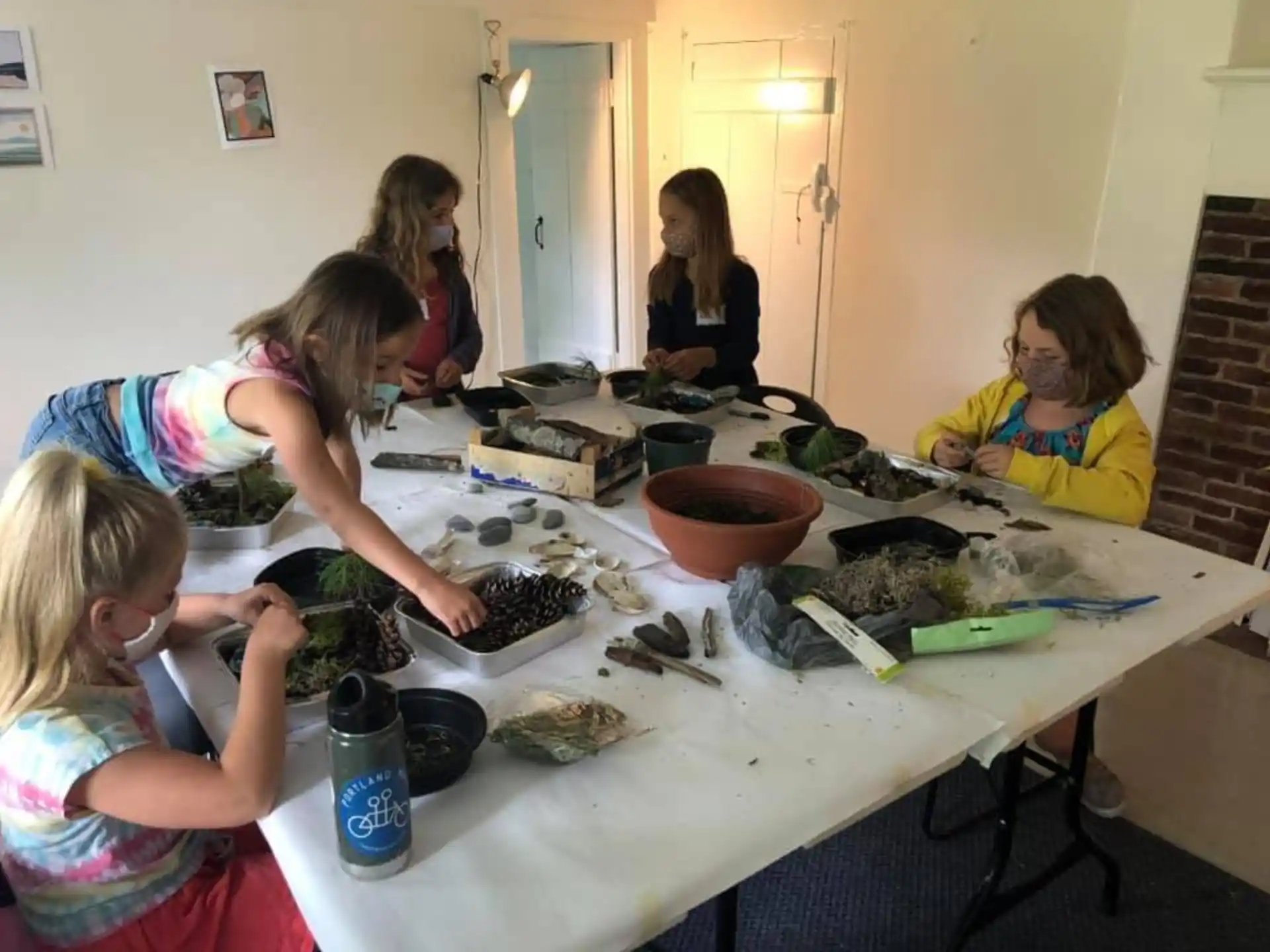a group of people around a table