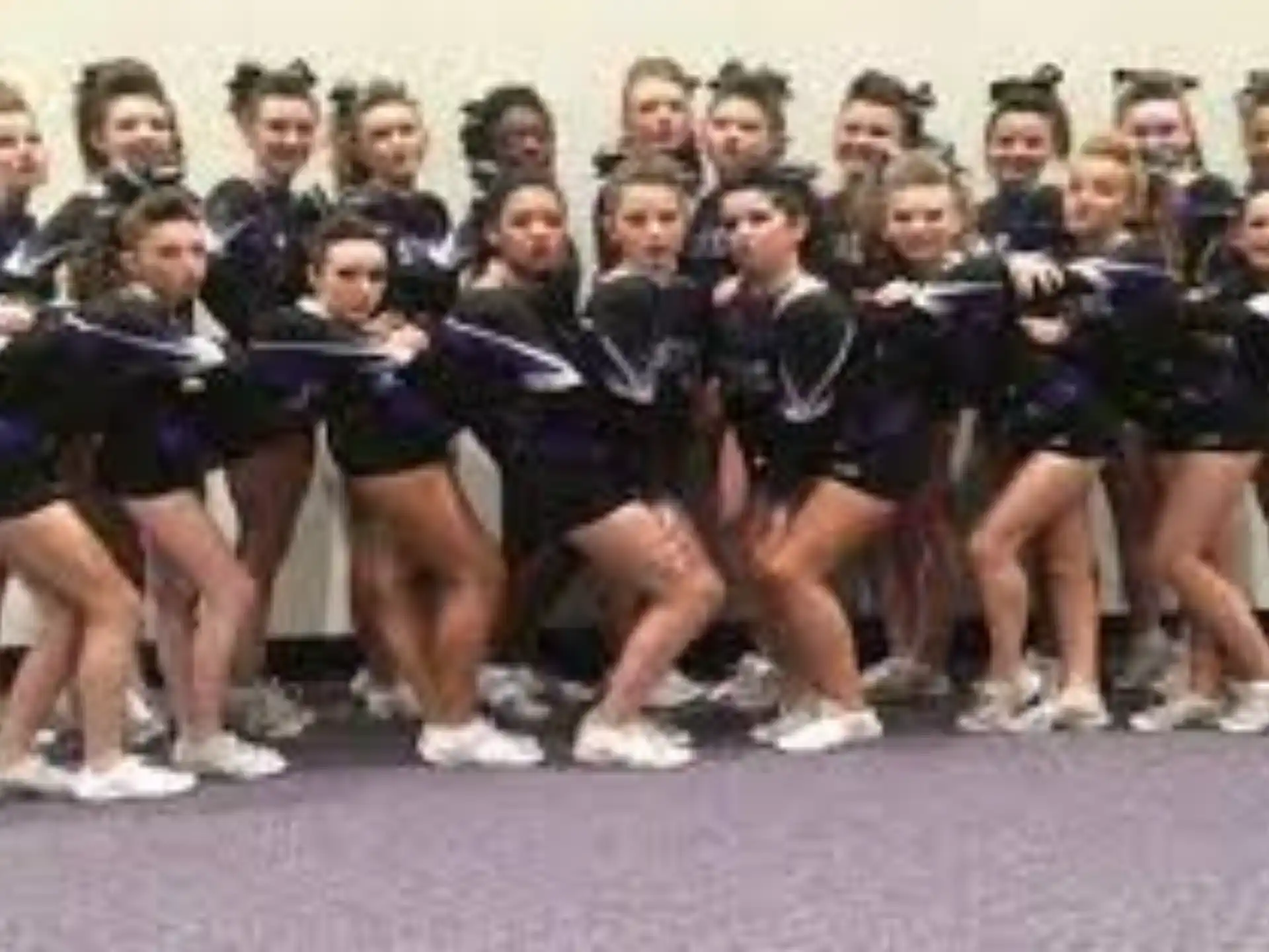 a group of cheerleaders performing