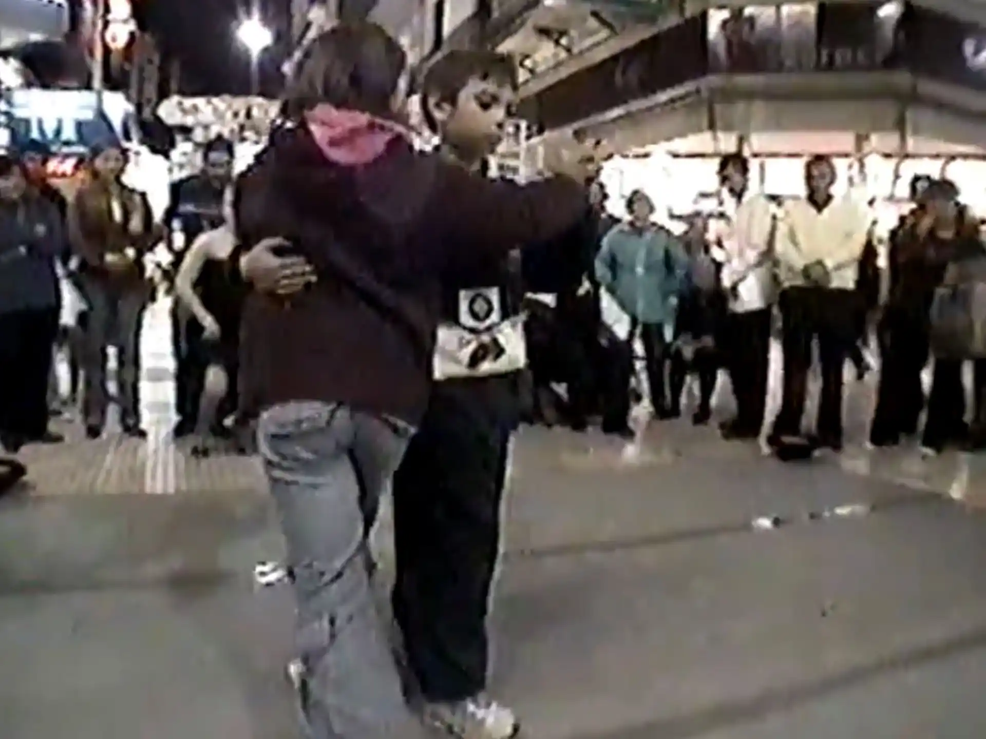 a man holding a woman