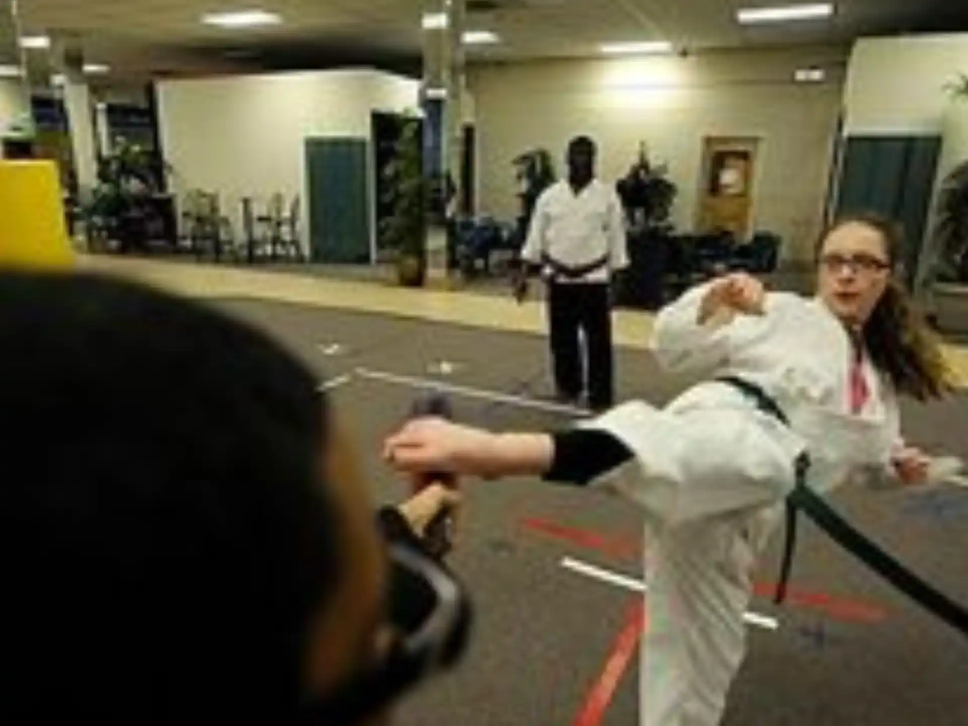 a person in a karate uniform