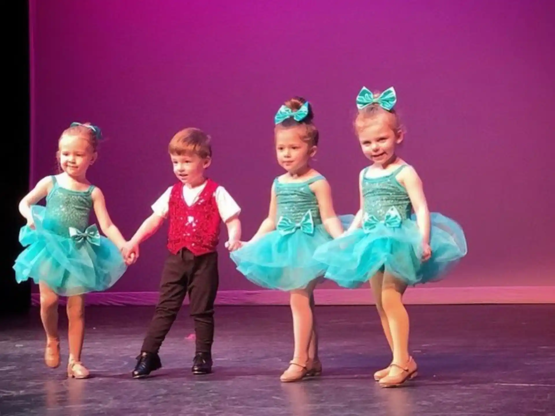 a group of children in clothing