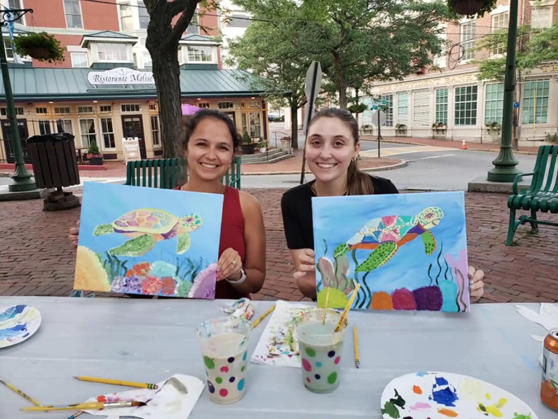 two women sitting at a table