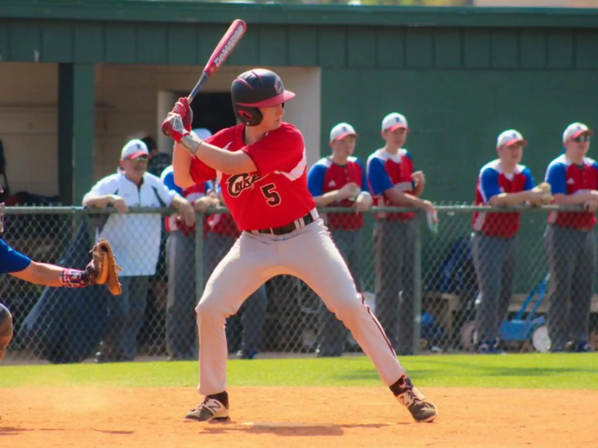 a baseball player swinging a bat