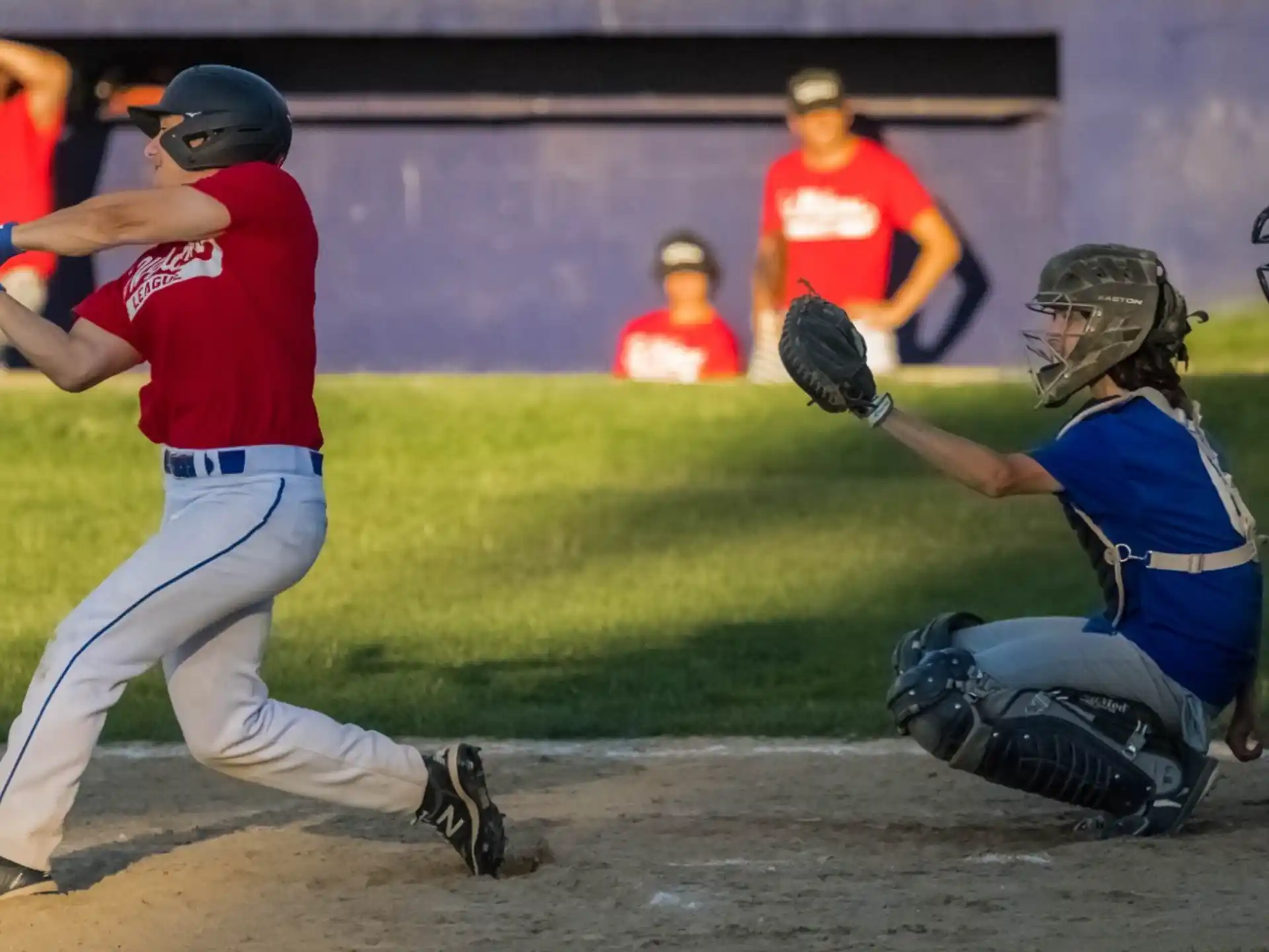 a baseball player swinging a bat