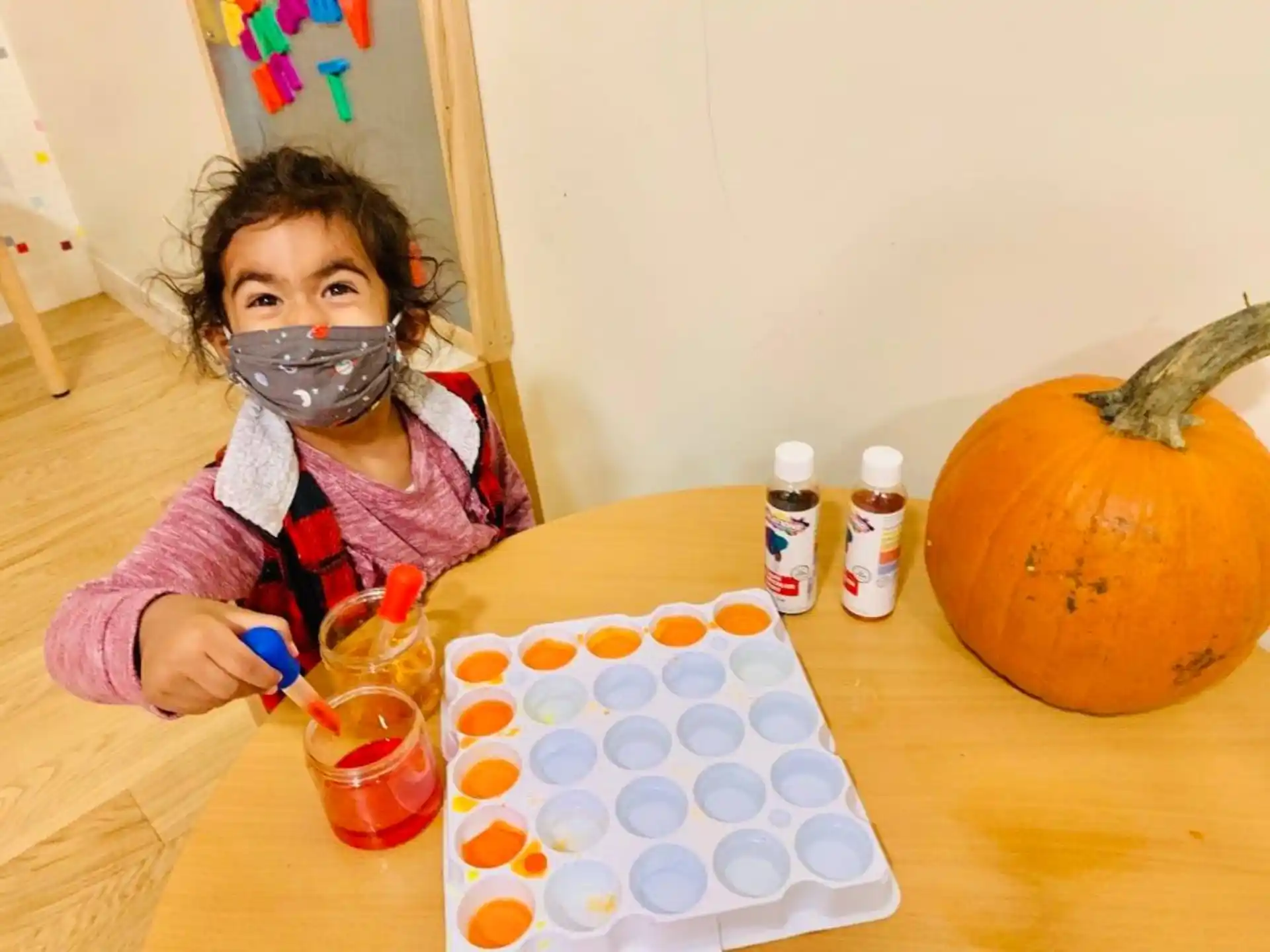 a girl painting a picture