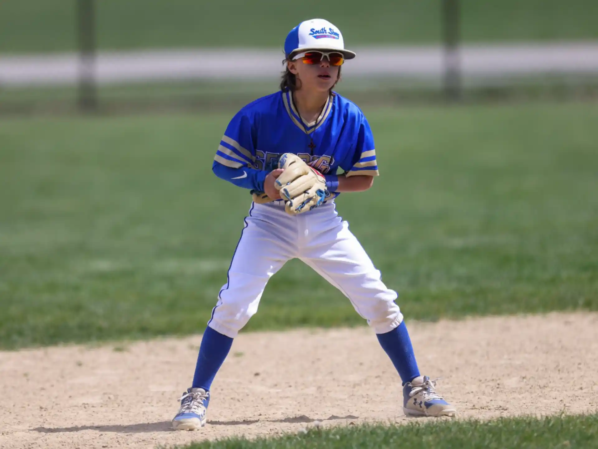 a baseball player in a blue uniform