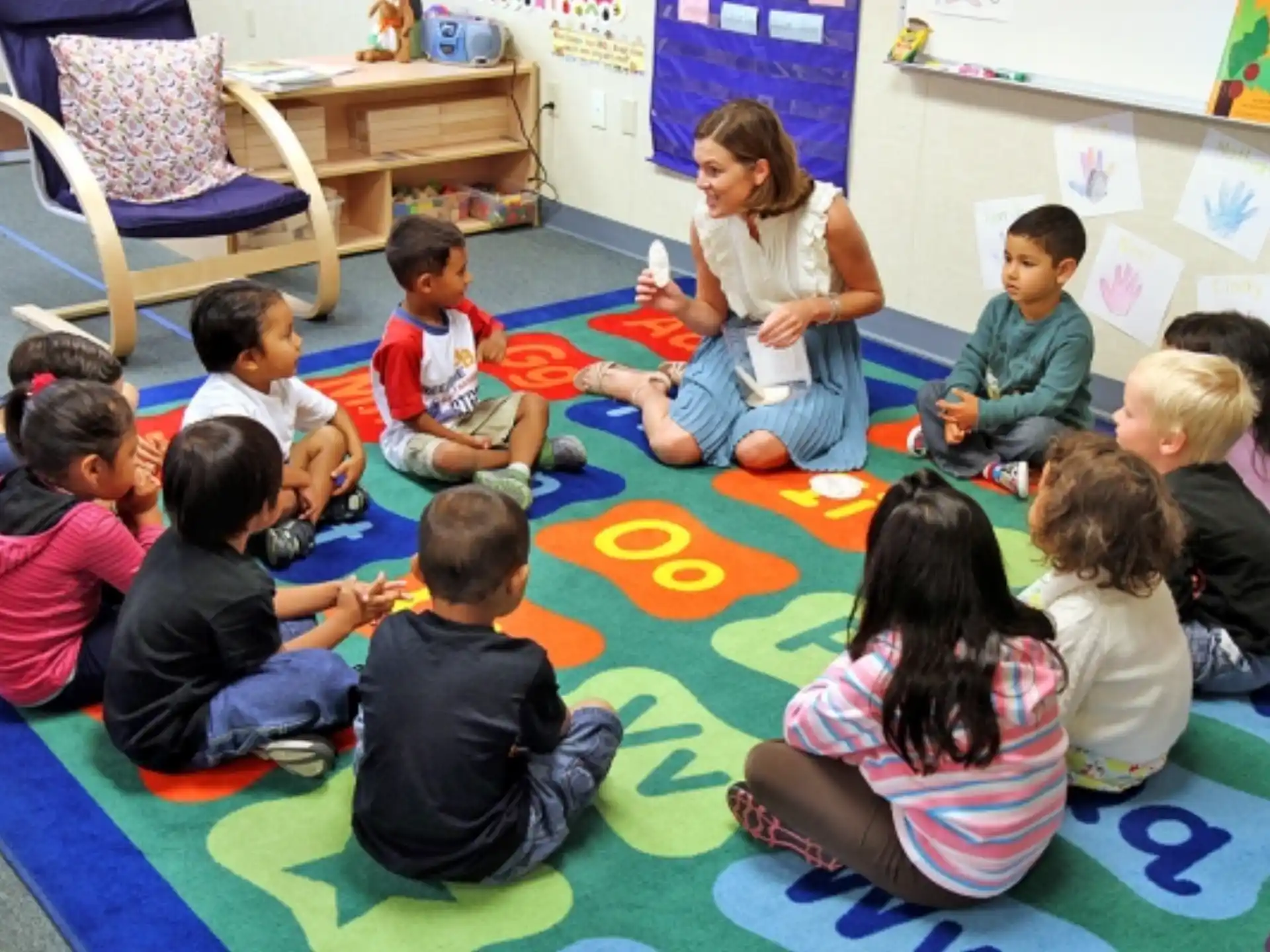 a group of children sitting on the floor