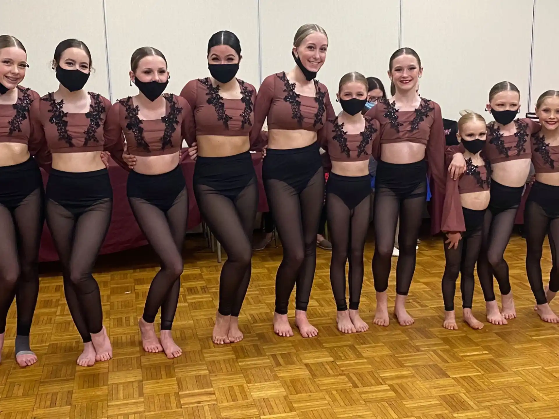a group of women in a dance pose
