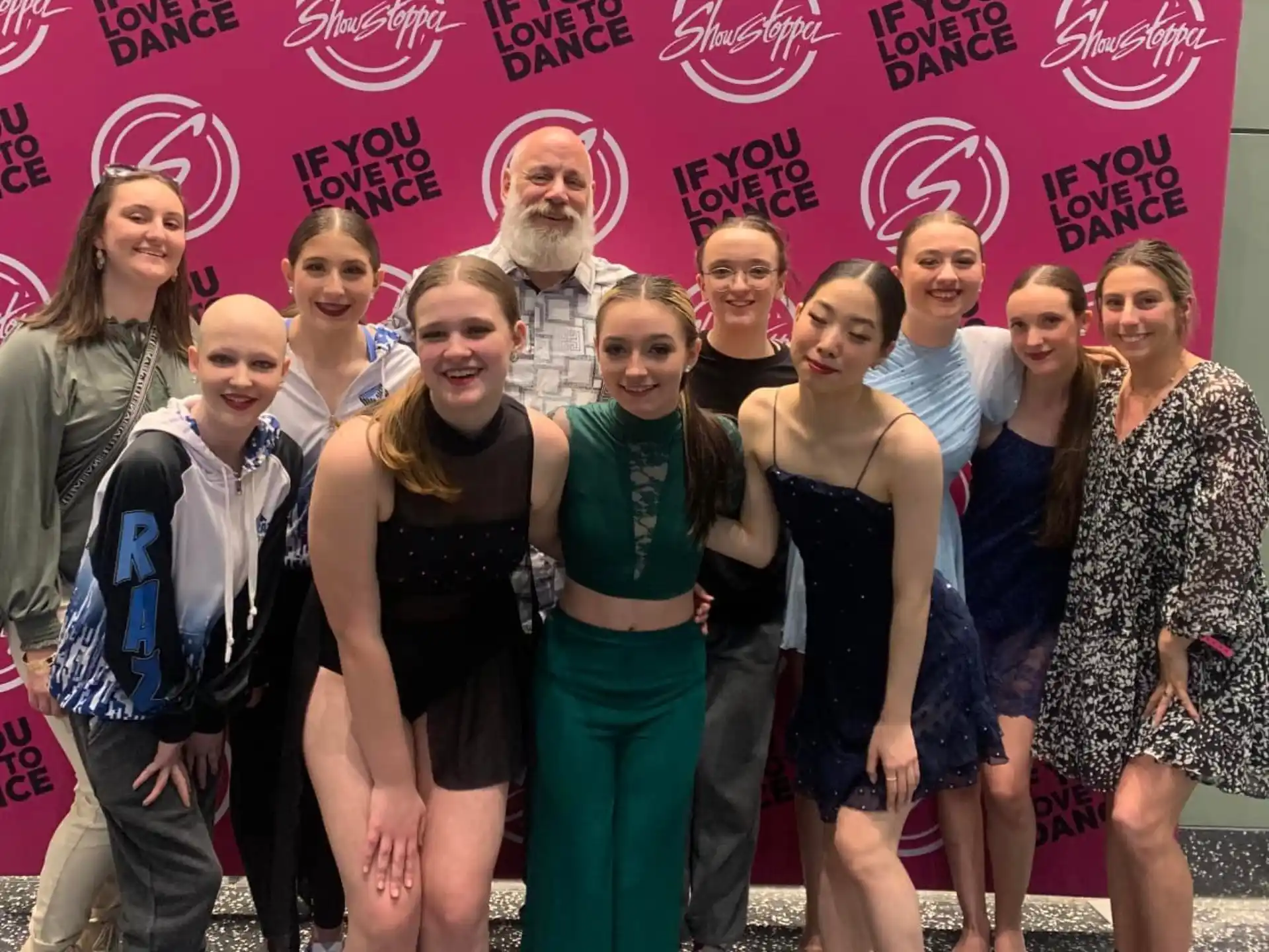 a group of people posing for a photo