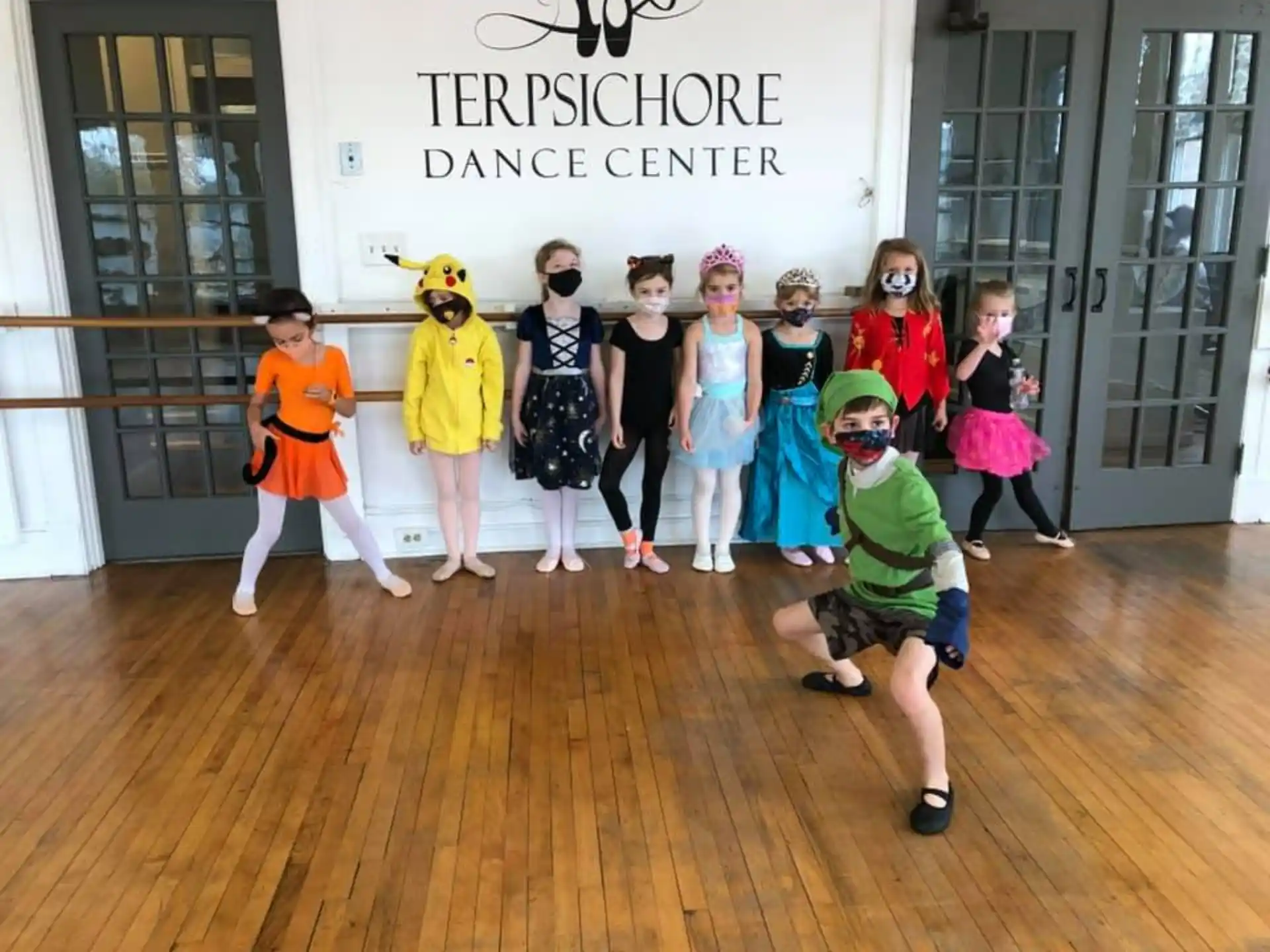 a group of children in clothing