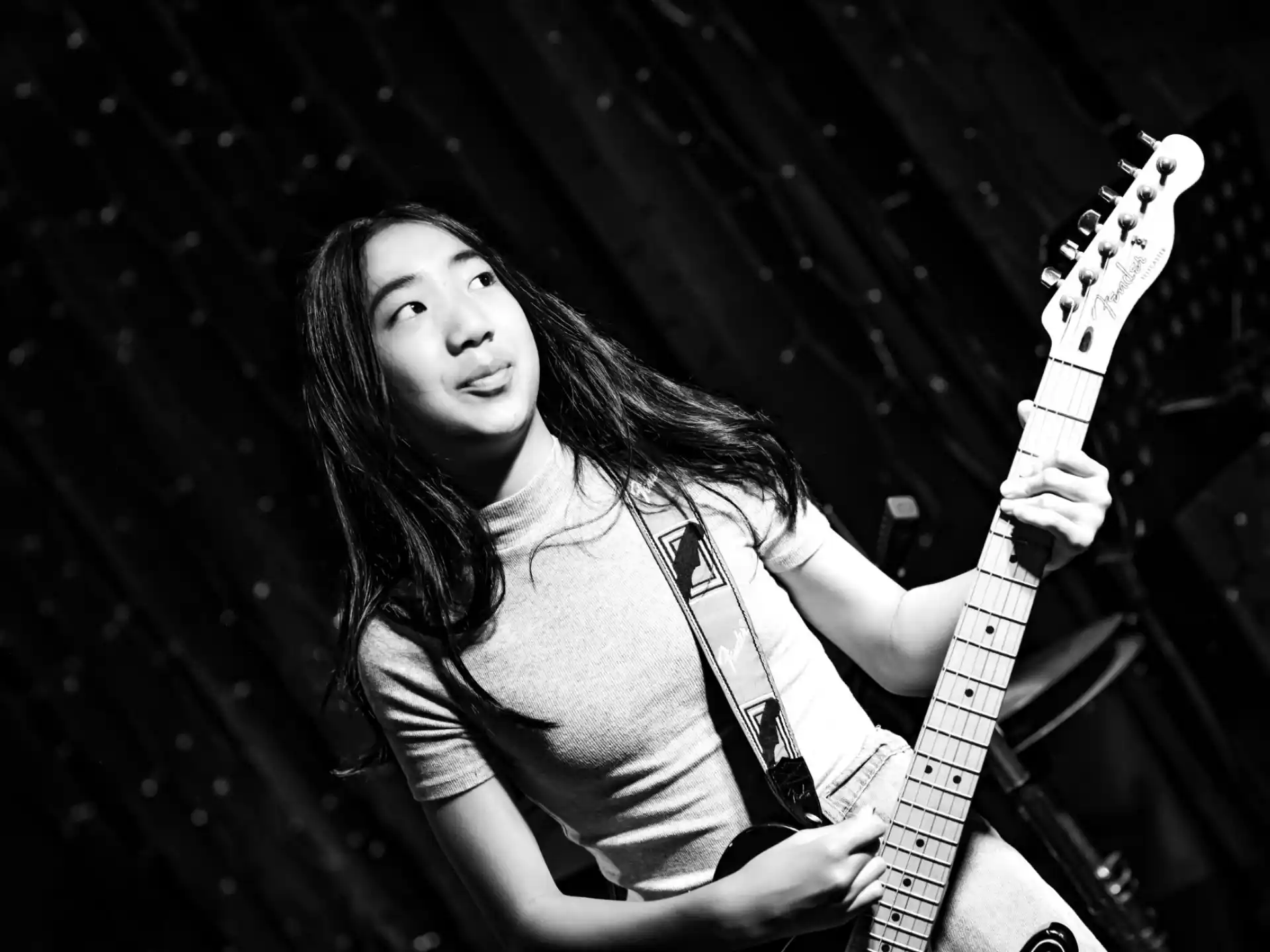 a person playing a guitar