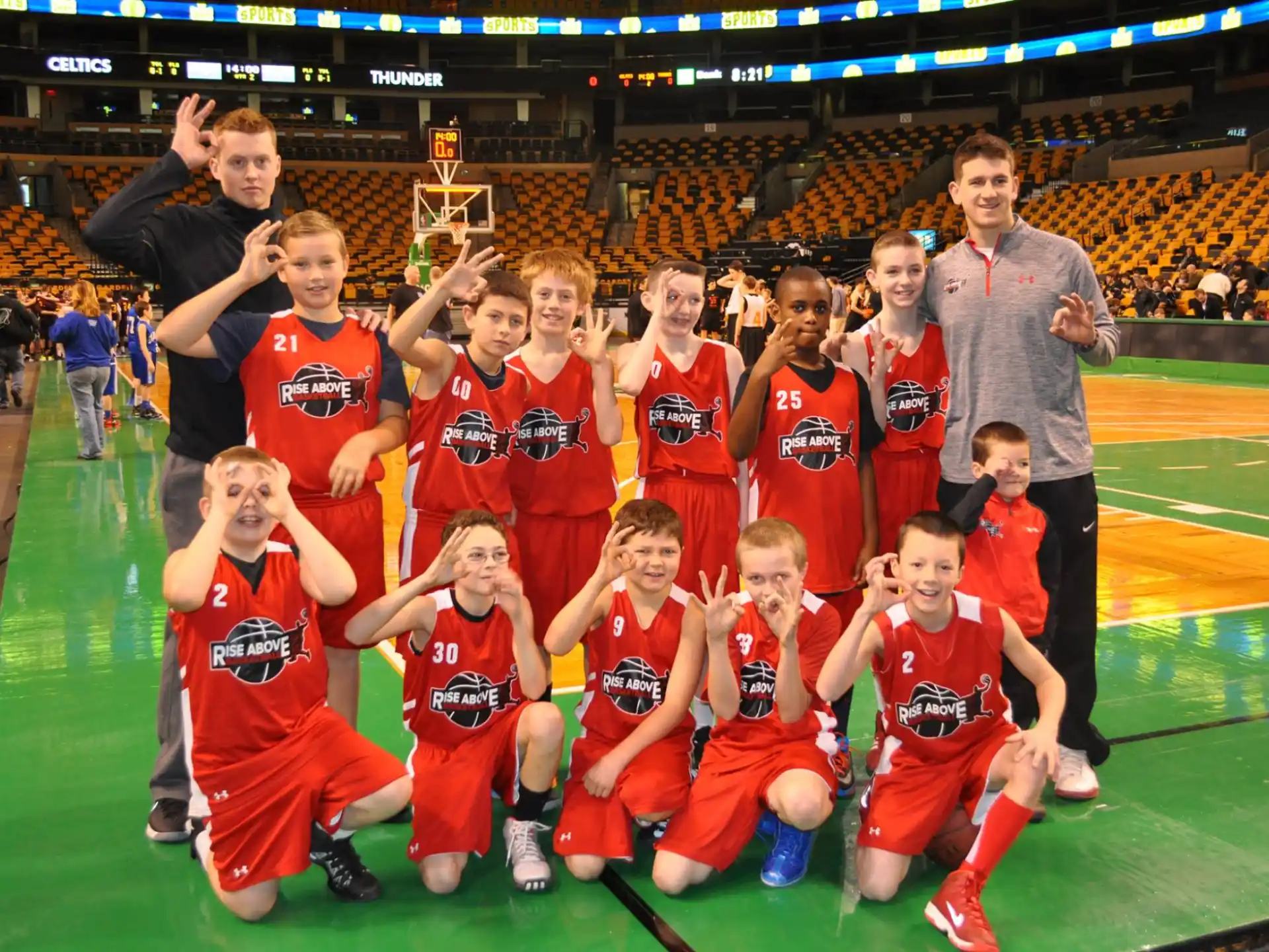 a group of football players posing for a photo