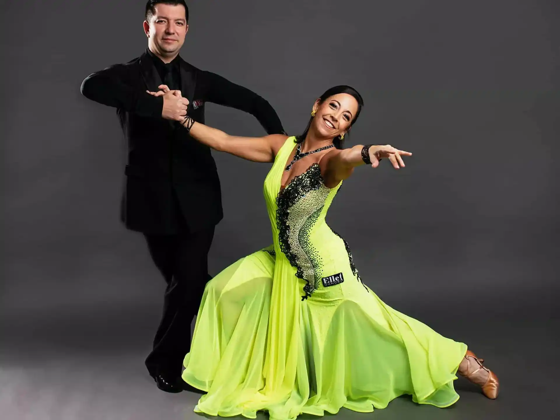 a man and woman dancing