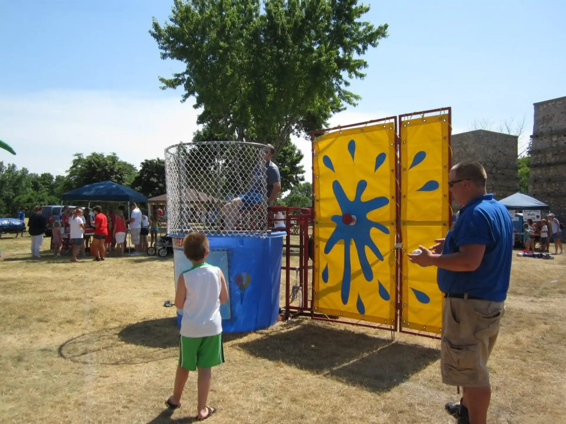 a man and a child at an outdoor event