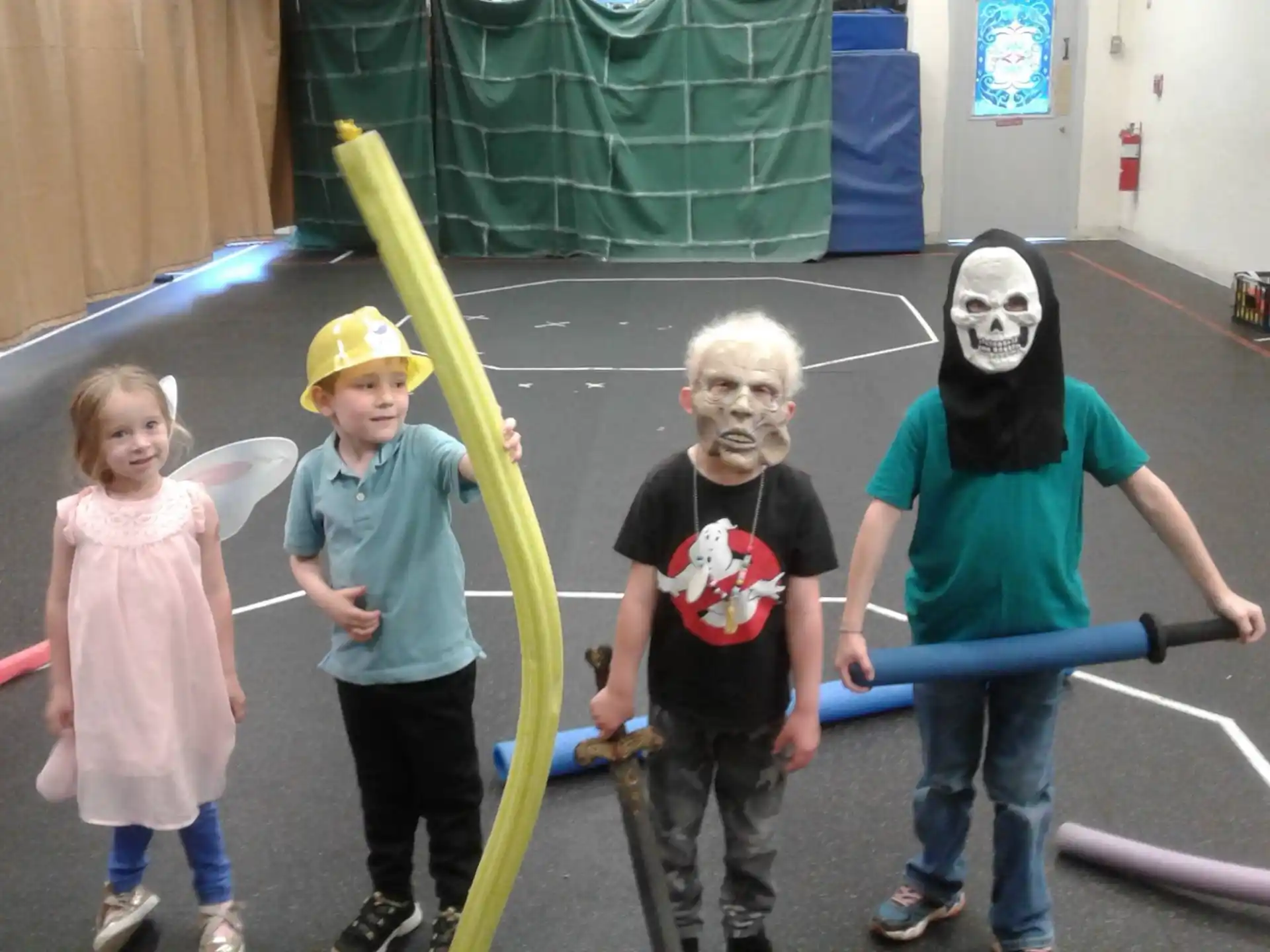 a group of kids wearing masks