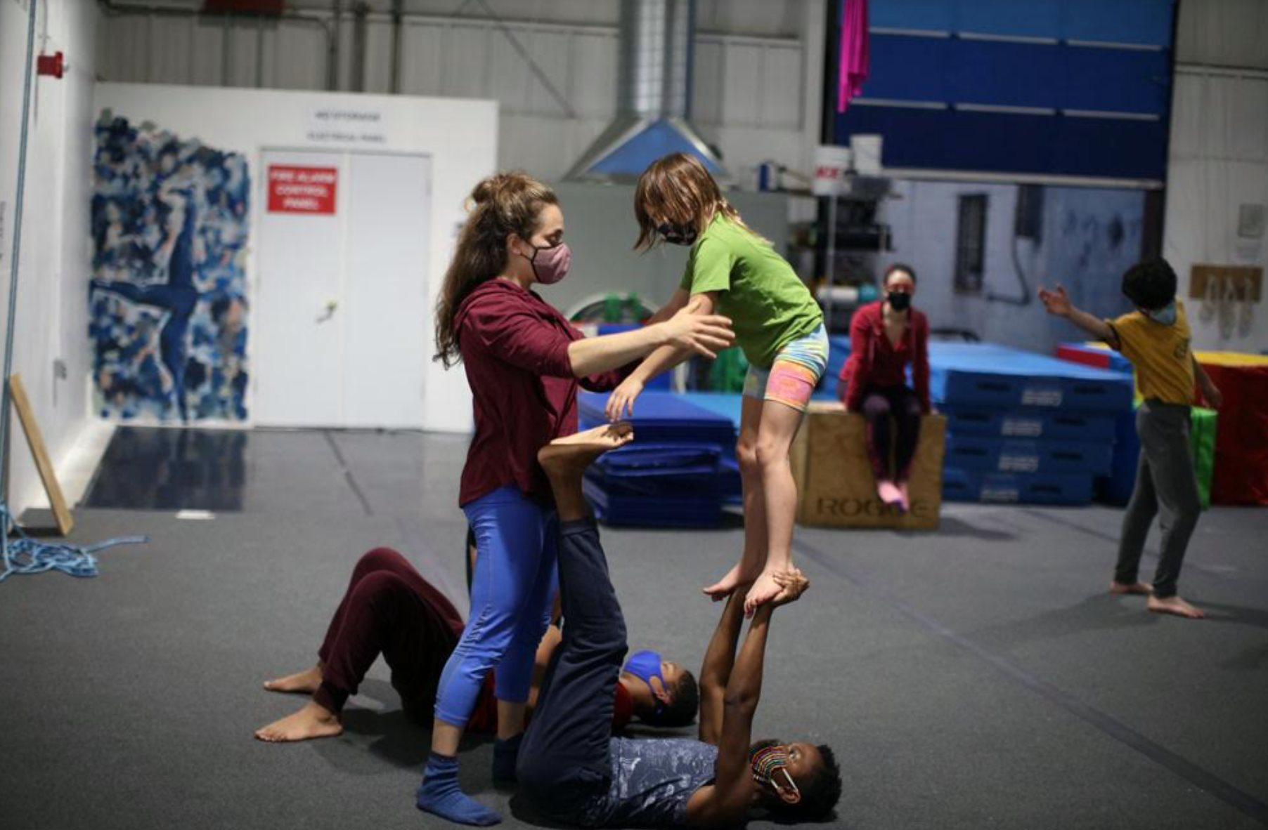 a group of people doing yoga