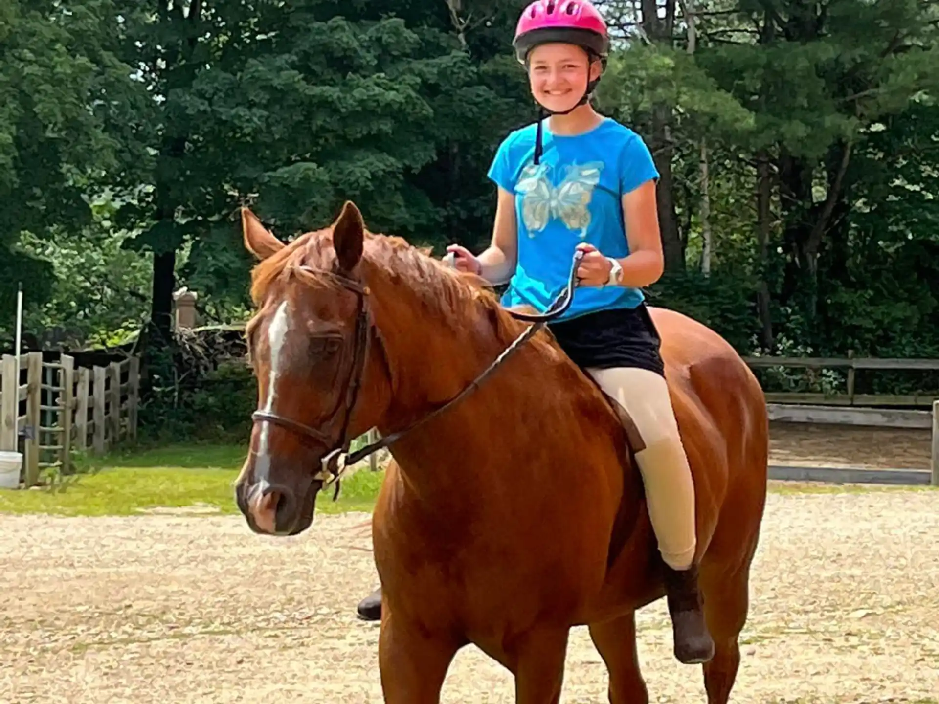 a girl riding a horse