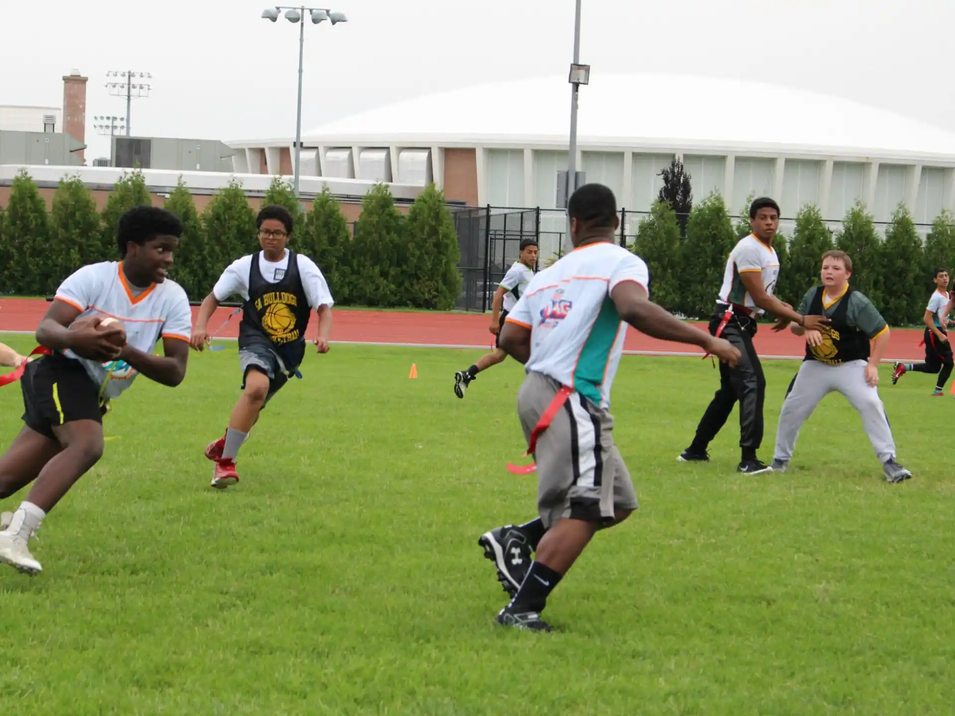 a group of men playing football