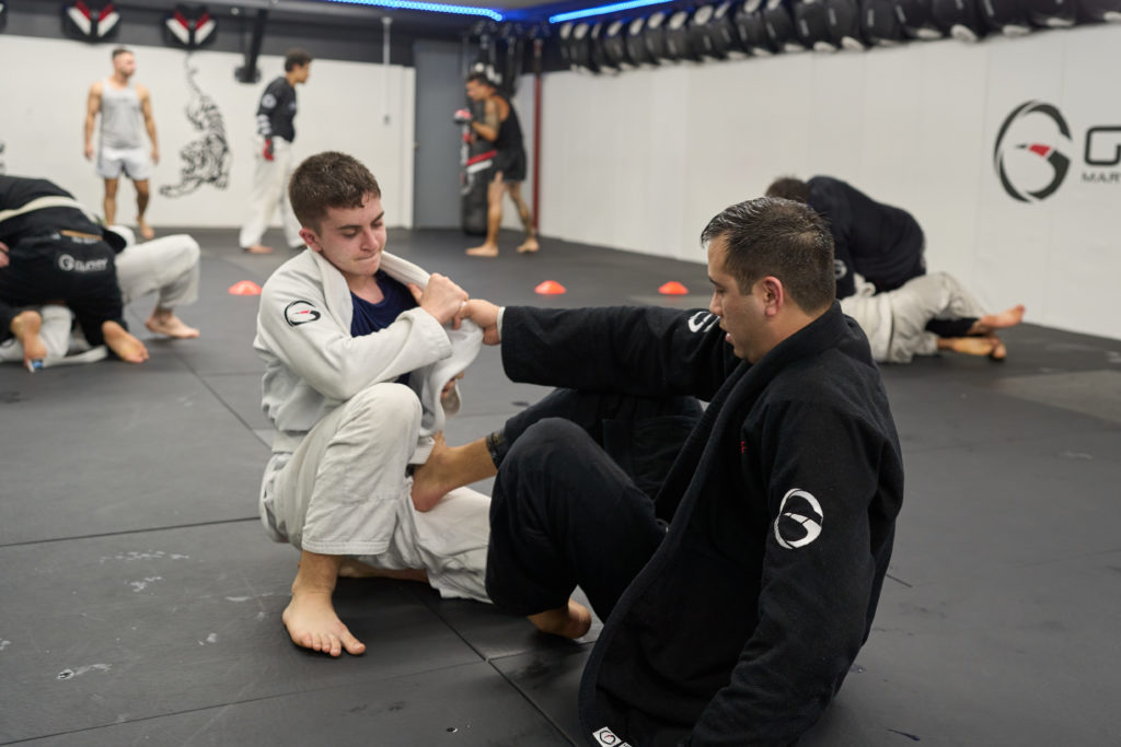 a group of people sitting on the floor