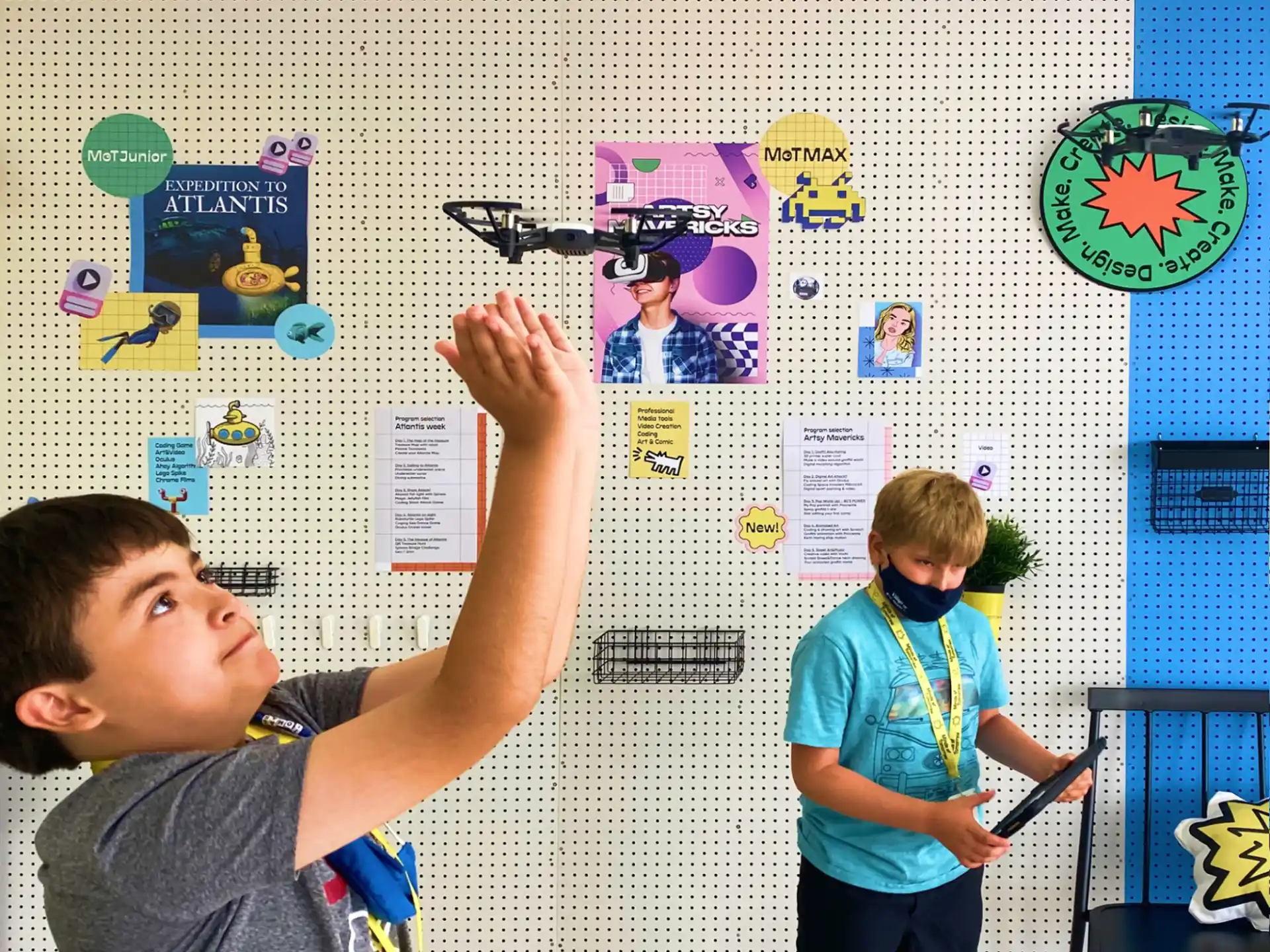 a couple of boys in a classroom