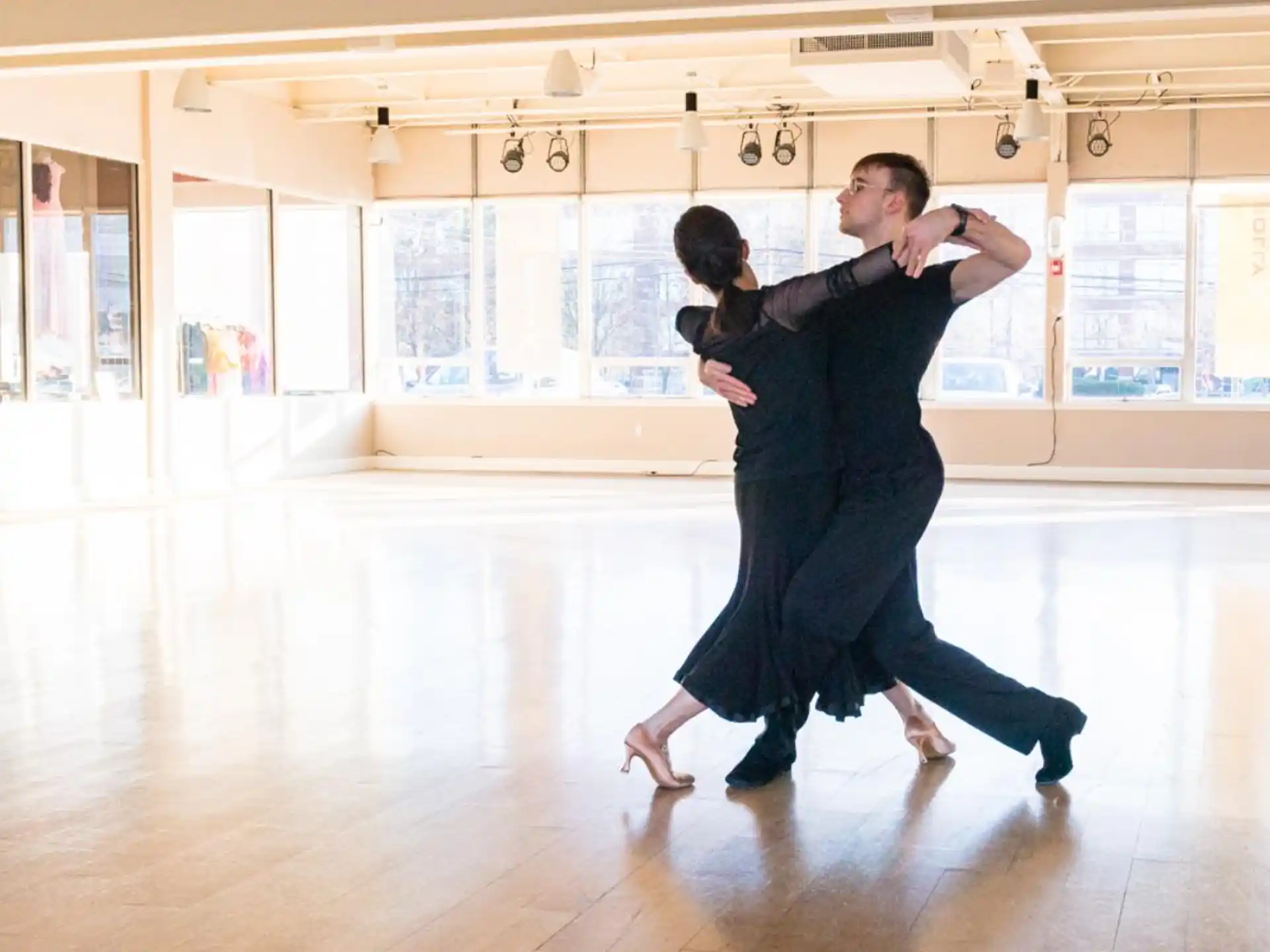 a man and woman dancing