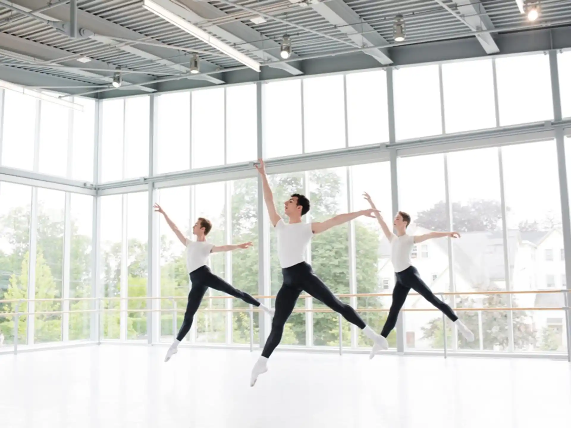 a group of people jumping in the air