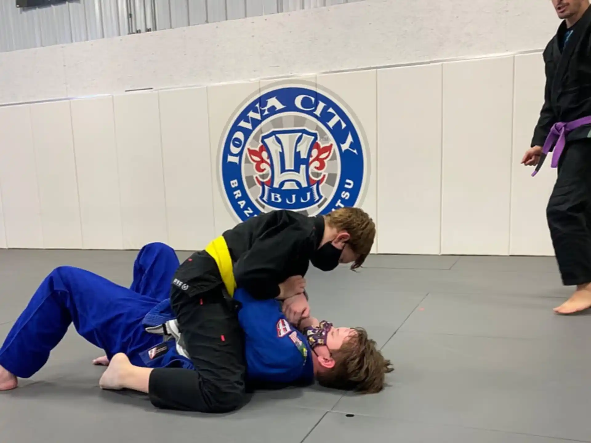 a person holding another man